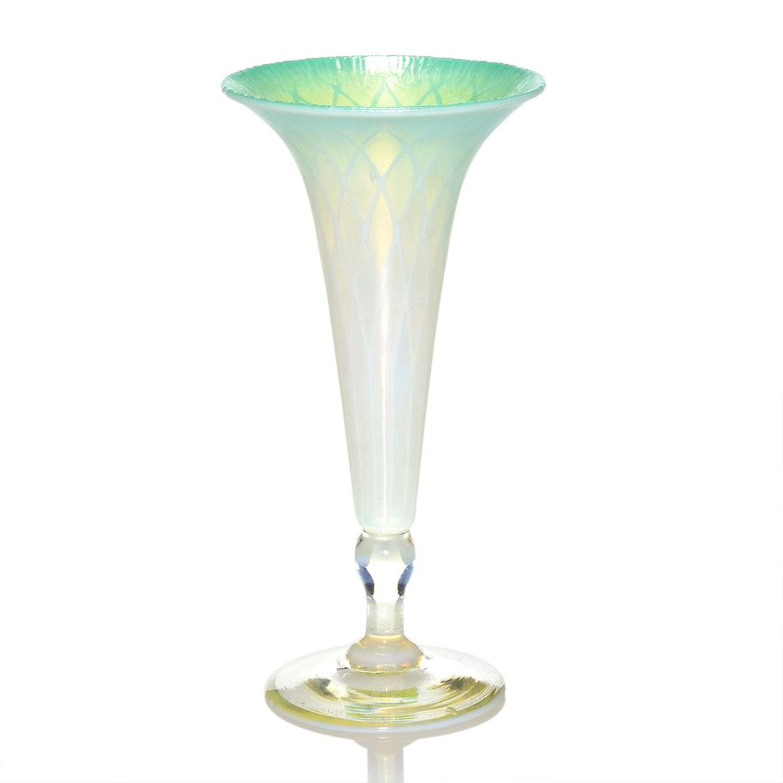 Tiffany aqua Pastel trumpet vase, 7", signed: Tiffany Favrile aqua Pastel trumpet vase with a nice opal net pattern. Height 7 inches. Engraved L.C. Tiffany Favrile, 1881 in the pontil. Tiny factory cinder speck in the base and a nick on the edge.