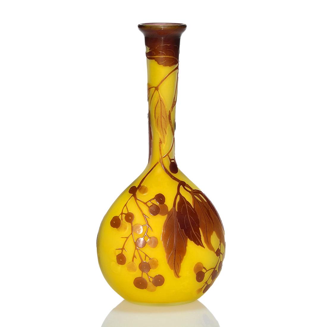 Galle cameo banjo vase, berry branch, 6 3/4", signed: Galle cameo banjo vase with an all around design of dangling branches of berries and foliage in brown silhouetted over a nice frosty yellow. Height 6 3/4 inches. Cameo signature on the side. Showy in 