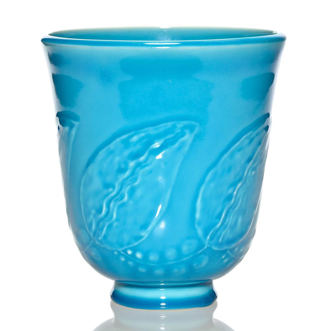 Kenton Hills vase May 1-'40, "Bone-Ware", 7 1/4": Kenton Hills vase with cast leaf design by William Hentschel covered in the Persian Blue glaze. Marked on the bottom with the early HB logo, William Hentschel's monogram, shape 117, and incised "Bone-