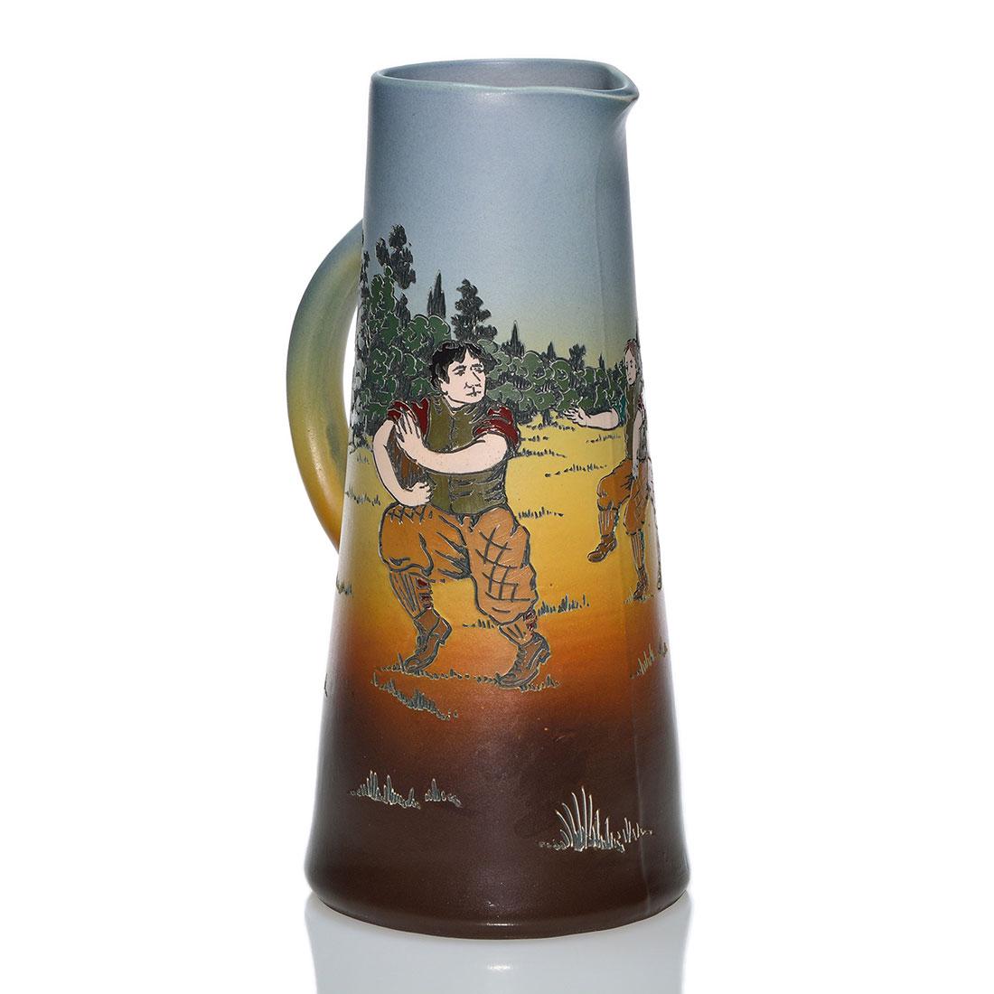 Weller Dickens Ware II pitcher, football, 11 7/8 inches (1 of 2)