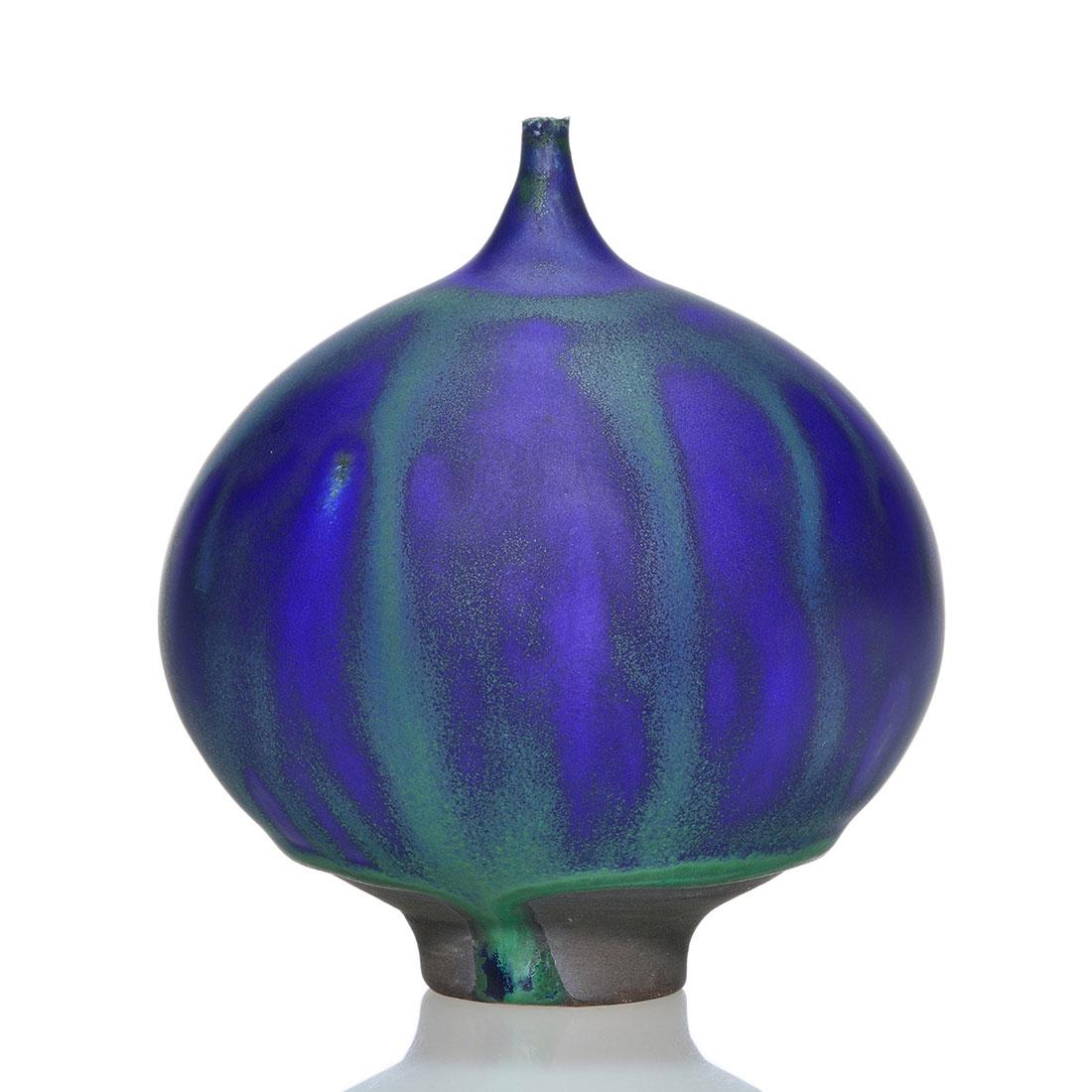 Cabat Feelie vase, green over purple, 4 1/8": Cabat Feelie vase covered in purple glaze over which green glaze was dripped. Incised on the bottom 841 Cabat 47. Excellent original condition. Height is 4 1/8 inches.
