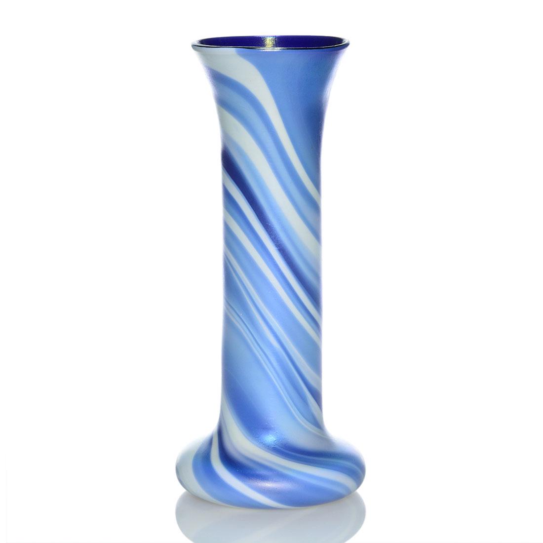 Imperial Lead Luster vase, cobalt & white, 11 1/4": Large Imperial Lead Luster cylinder vase marbleized by cobalt blue and opal white and having a rich cobalt cased interior. Height 11 1/4 inches. Spurious Tiffany signature. Pleasing pattern. Excellent