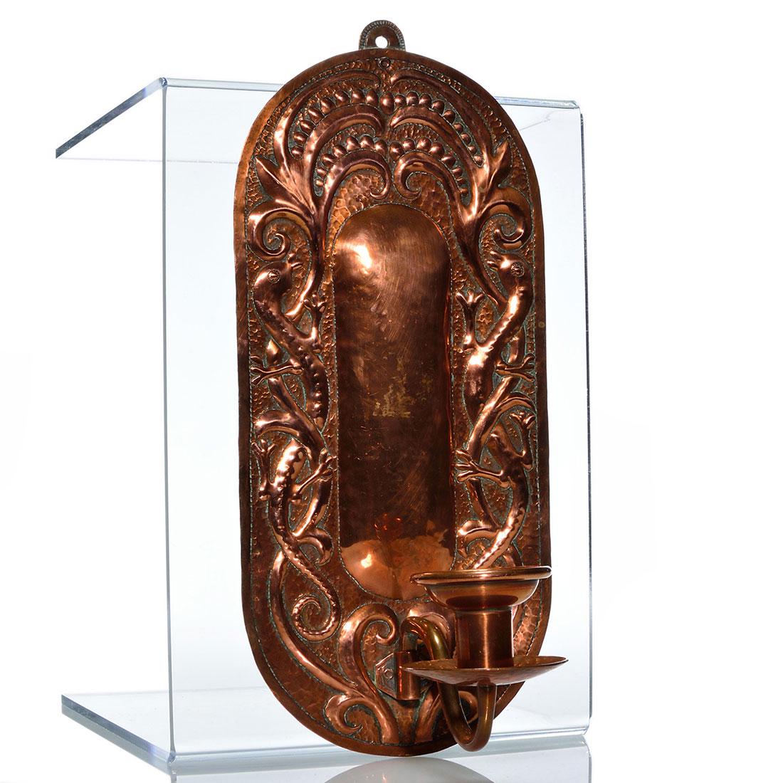 John Pearson repousse' copper sconce, 13 3/4": English master craftsman, John Pearson of the Newlyn School and Guild of Handicrafts, repousse' copper hanging wall sconce with salamander designs on either side and candle holder with heavy bobeche'