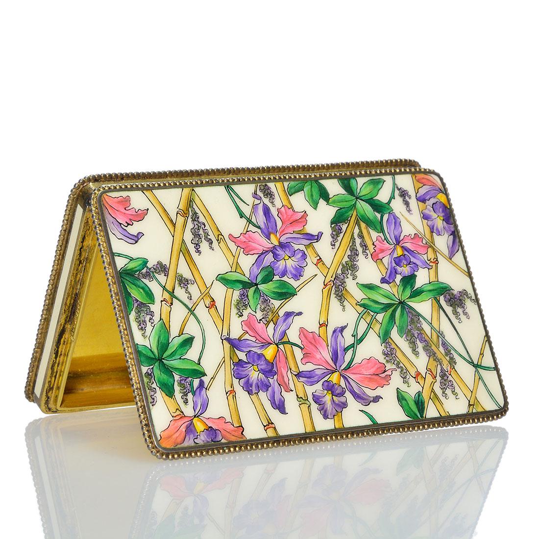 Alfred Dunhill,Argent Dore Sterling case,orchids,2 1/4": Alfred Dunhill, Paris, Argent Dore' sterling inlay case, the cover hand painted with colorful orchids and bamboo stalks. Measures 3/8 inches by 2 1/4 inches by 3 1/4 inches. Engraved Alfred Dunhill, P