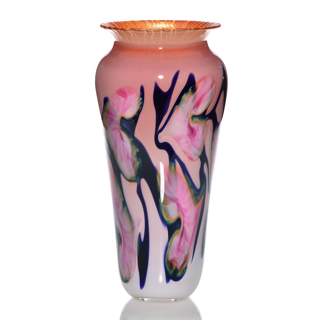 John Lotton cased vase, pink white leaves, 11 3/4",: John Lotton cased vase with white and pink leaves adhered to blackish cobalt vines. The interior is cased in sunset orange which adds a blush of the color to the white exterior. Interesting is the fla