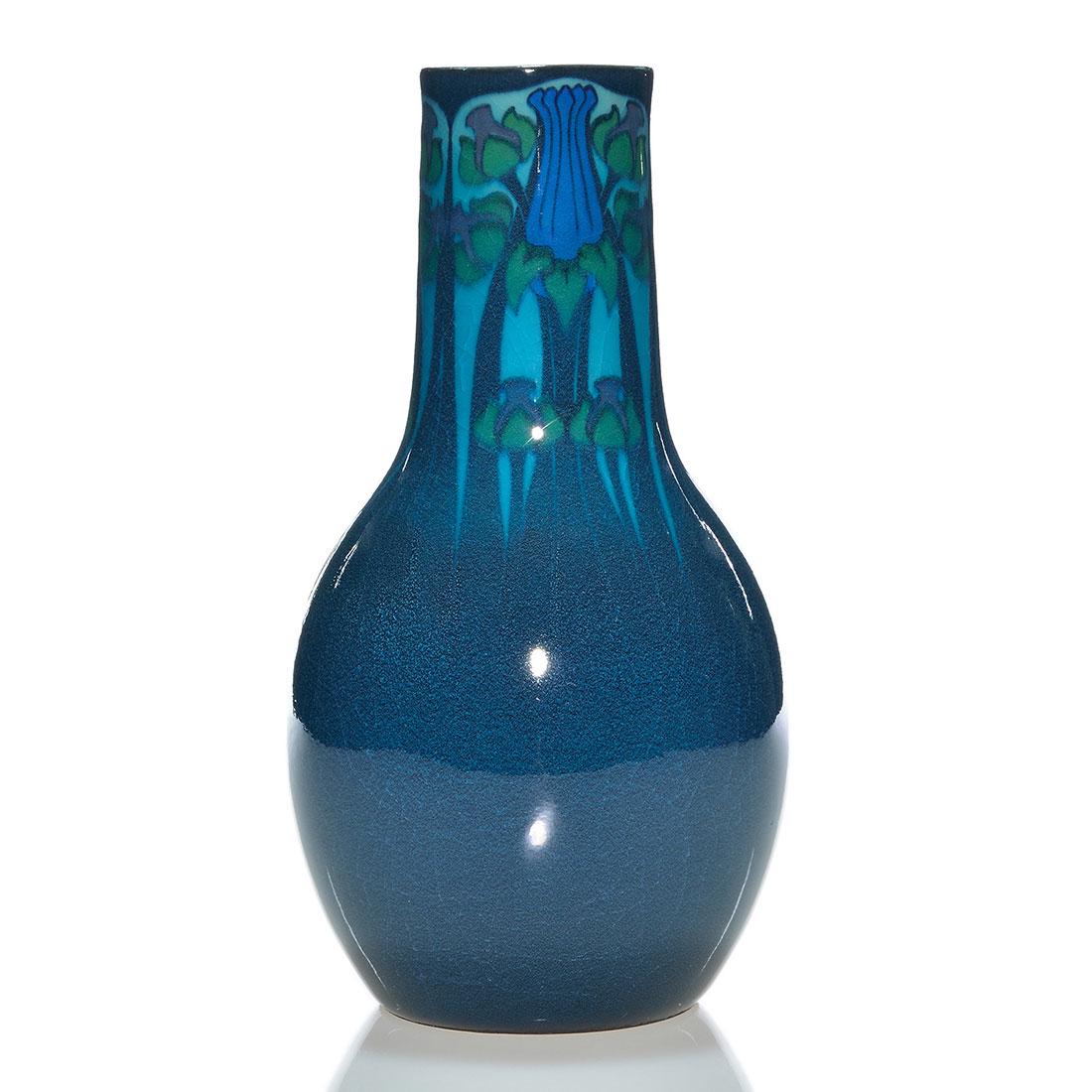 Rookwood Blue Tinted, Sax, floral, 1918, 9 7/8": Blue Tinted Porcelain vase decorated in 1918 by Sara Sax, who arrayed three repeating panels of stylized flowers around the upper portion of the vase, which was then covered with the blue tinted glaze