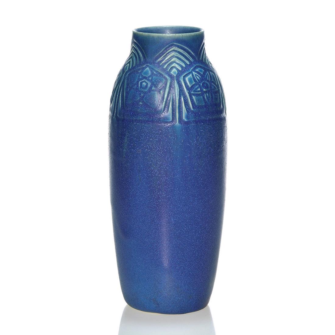 Rookwood carved mat vase, Hentschel, 1913, 982D, 9 1/4": Carved Mat vase with floral medallions connected by arched grooves carved by William Hentschel in 1913 and covered by a nice blueberry glaze. Height 9 1/4 inches. Marked with the Rookwood logo, the da