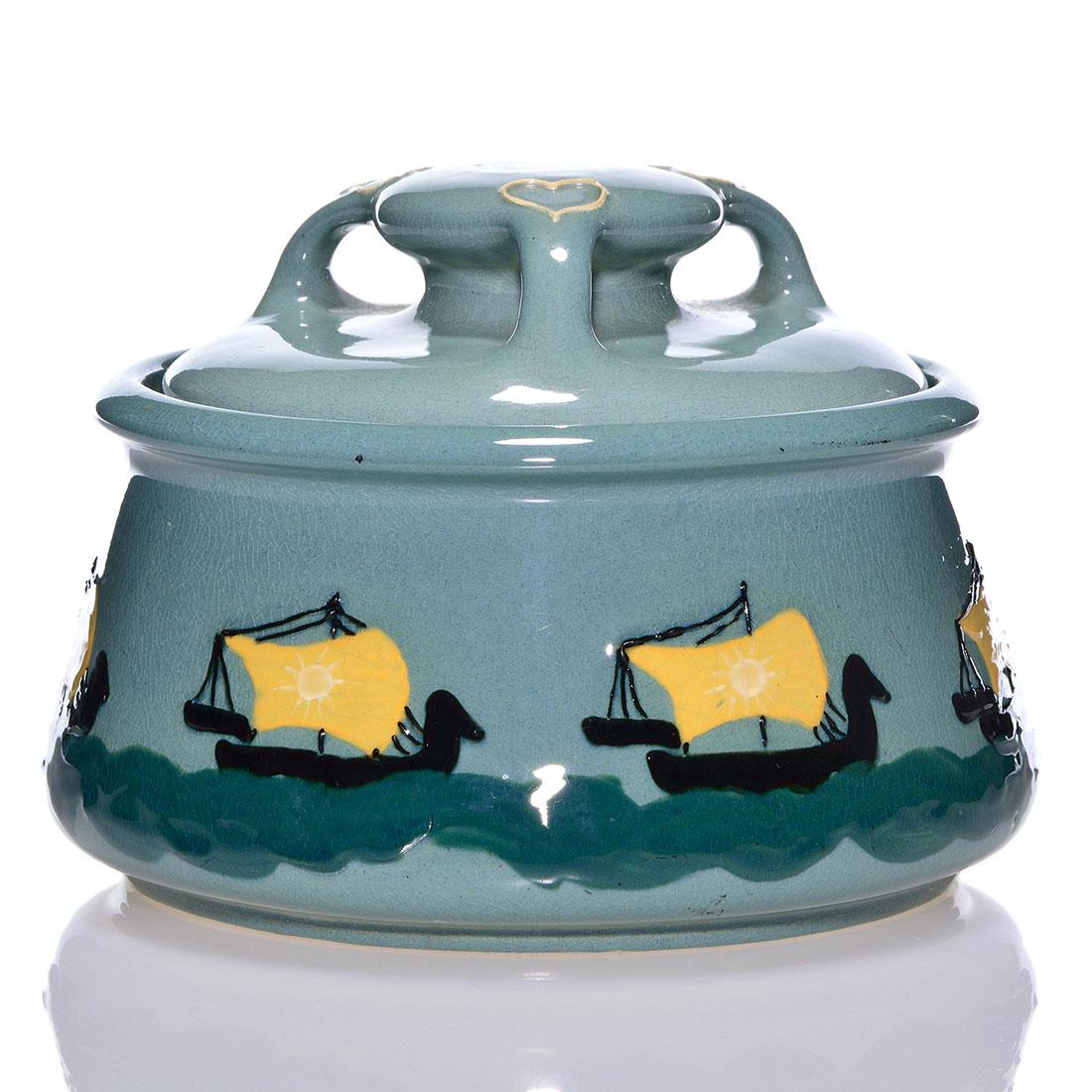 Rare Weller Jap Birdimal tobacco jar, ships, 4 1/4”: Rare Weller Jap Birdimal tobacco jar decorated with Viking ships. Mold marked on the bottom X and 511. Lid is unmarked. There is fine overall crazing. Height is 4 1/4 inches.