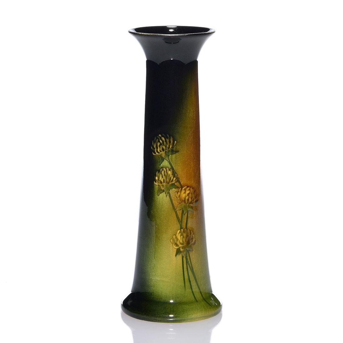 Owens Lightweight vase, clover, signed, 833, 8 3/4”: Owens Lightweight vase decorated with clover. Impressed on the bottom with the J B Owens logo, an incised artist’s mark - possibly Helen Smith - and shape 833. There is fine overall crazing. Height 