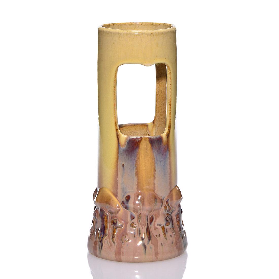 Fulper reticulated mushroom vase, 9 3/4”: Fulper reticulated vase with a gathering of mushrooms molded about the base. A flambé high glaze of ivory flows over Elephant’s Breath flambe’ producing a very handsome contrast and union of colo