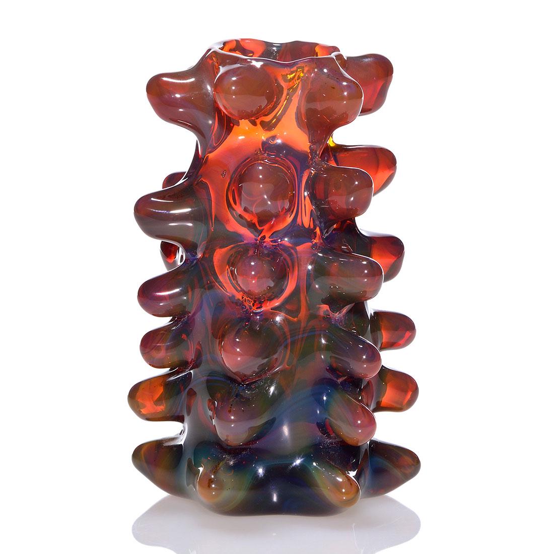 Labino hobnail vase, amber/blue, 5 1/2”, signed, 1970: Dominick Labino honey amber vase surrounded by six rows of hobnails revealing blue and green marbling. Height 5 1/2 inches. Artist engraved with 1970 date. Curious and innovative vase. Excellent condi