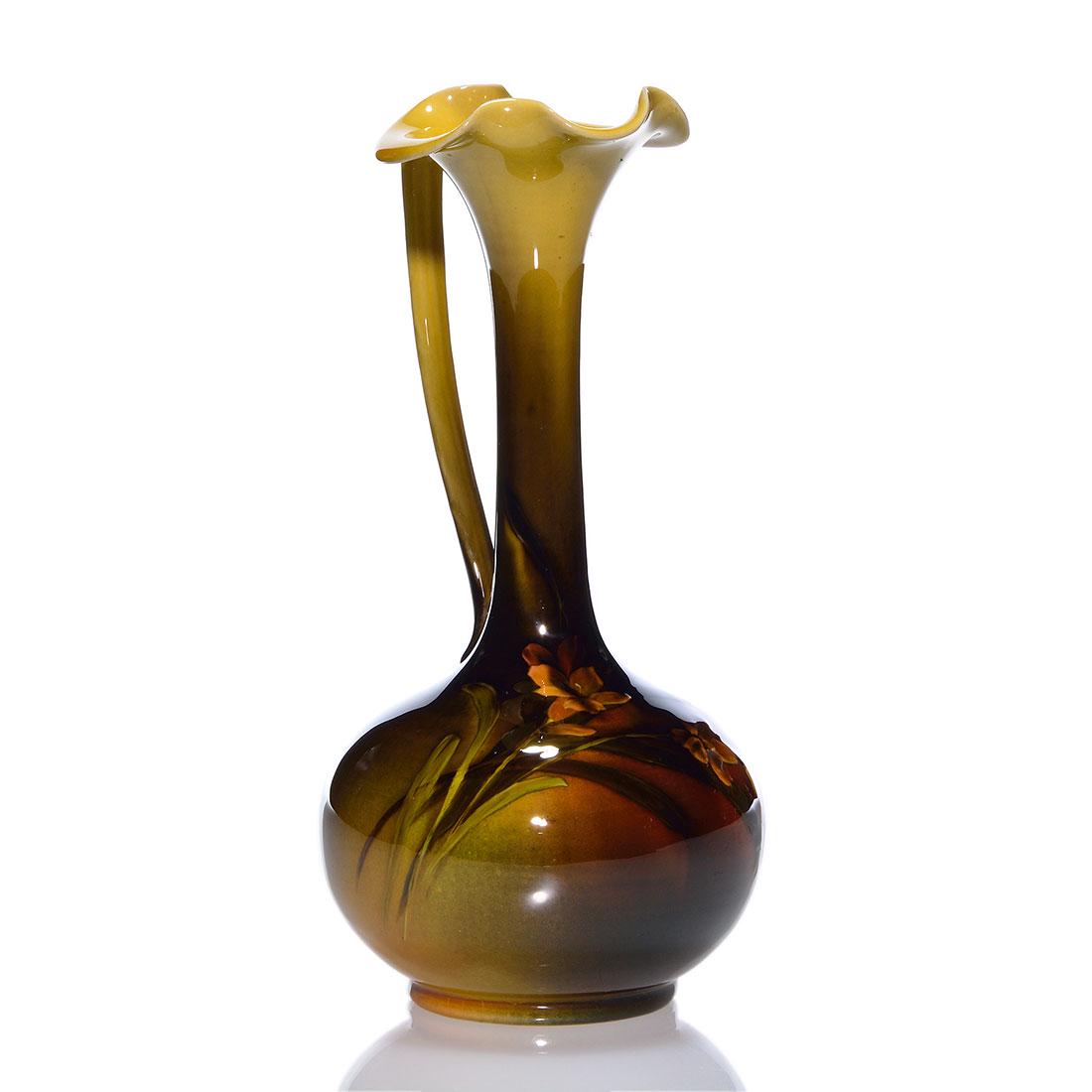 Rookwood Standard glaze ewer, Sprague, 1892, 595, 8": Standard glaze ewer with bell flowers painted by Amelia B. Sprague in 1892. Marks include the Rookwood logo, which indicates the date, shape 595, an impressed W for White clay, an incised L for Light 