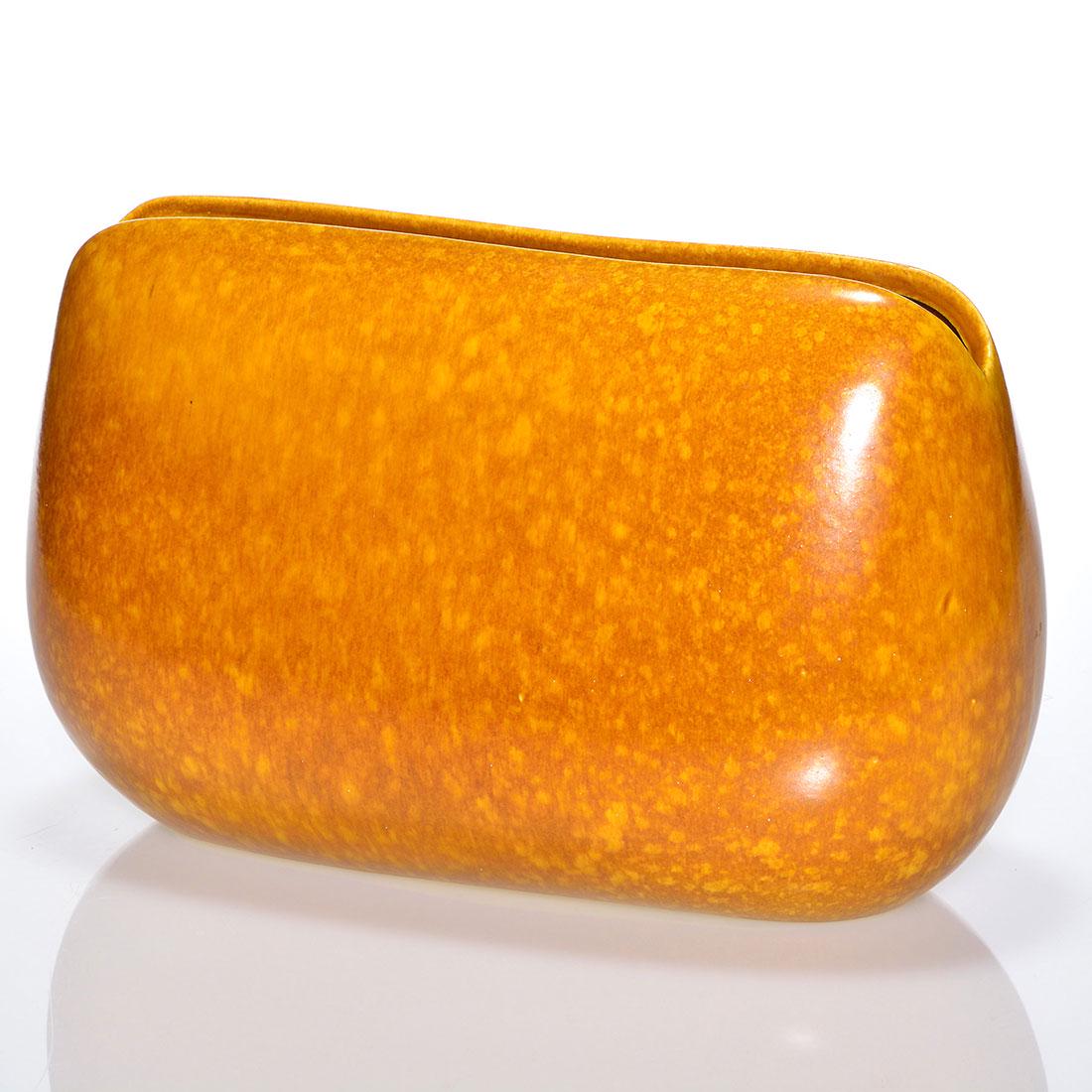 Roseville Raymor vase, shape 61-11, gold, 7 1/4": Roseville Raymor vase, shape 61-11, in gold. Marked on the bottom Raymor Modern Artware by Roseville U.S.A. 60-11. Excellent condition. Height is 7 1/4 inches.