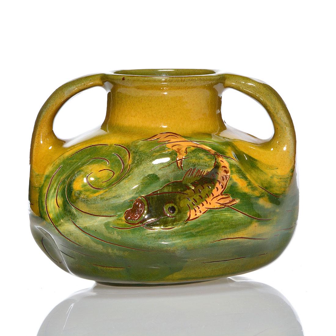 Weller Dickens Ware vase, fish, signed M., 4 1/4": Weller Dickens Ware twin handled pinched vase with incised decoration of exotic fish and waves done by an artist with the initial "M." Marked with the impressed numbers 23 and 1. The artist's M is pai