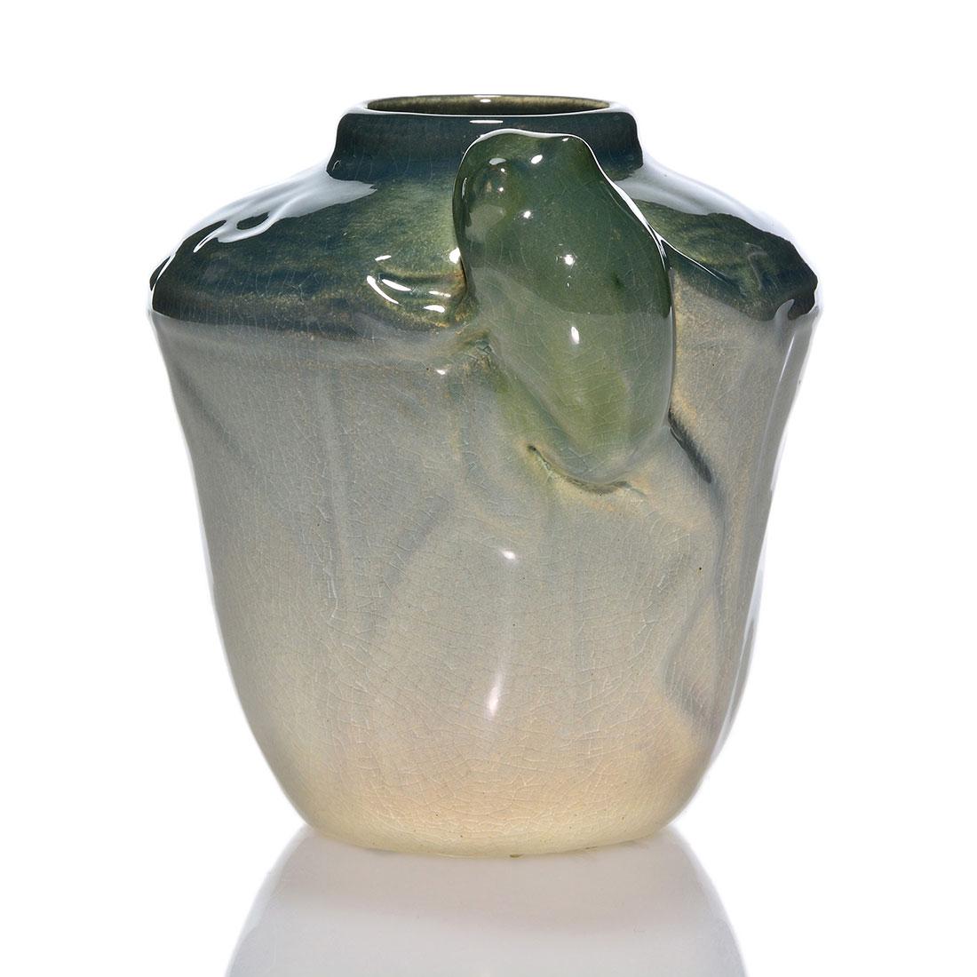 Weller Etna vase, frog, 4 inches: Weller Etna vase with a frog climbing over the shoulder. Incised Etna Weller on the bottom. There is fine overall crazing. Height is 4 inches.