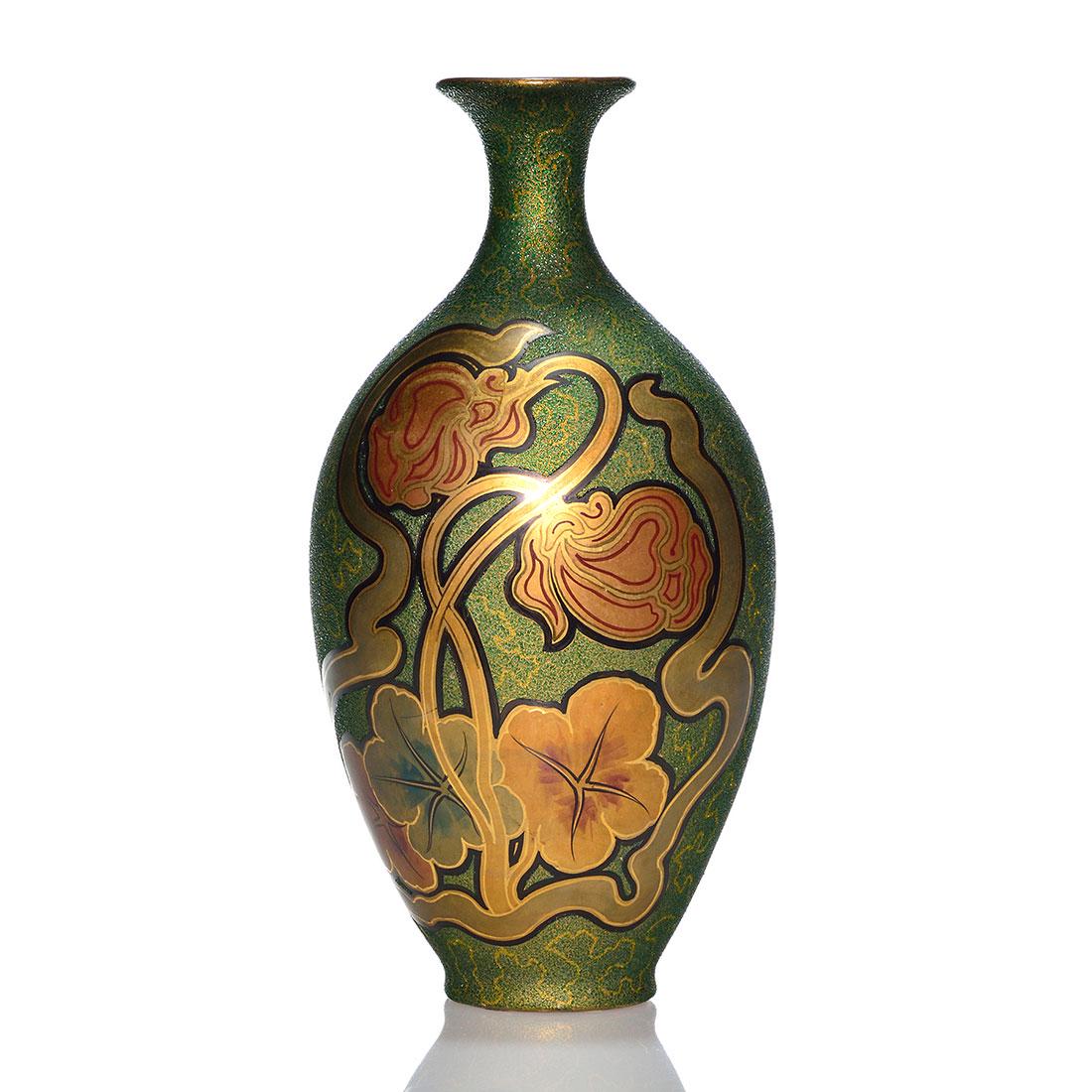 Owens Malachite Opalesce Inlaid vase, floral, 12": Handsome Owens Malachite Opalesce Inlaid vase with stylized flowers and leaves in luster gold, red, green and black on the green and gold beaded ground. Unmarked. Height 12 inches. There is a small ar