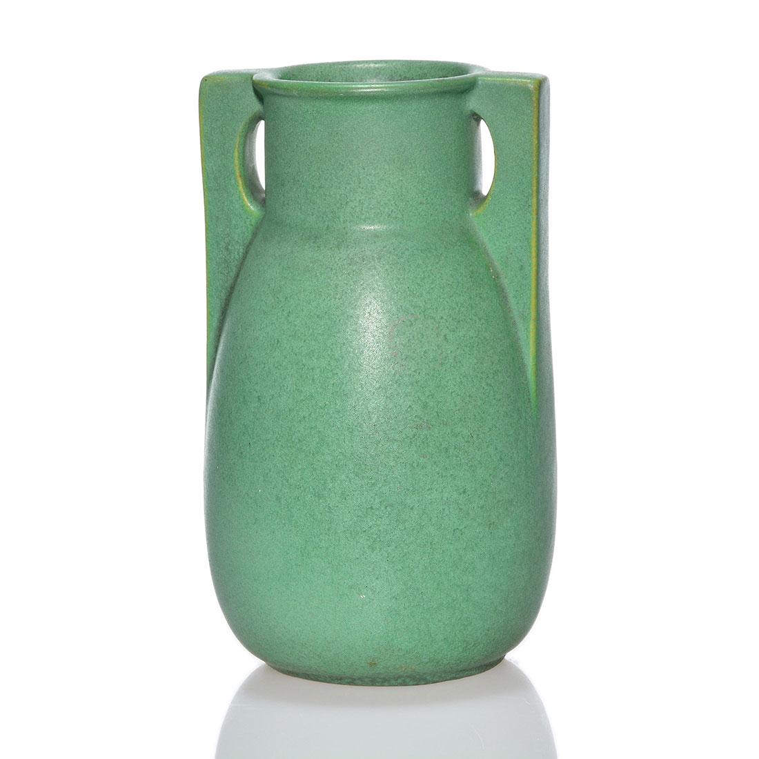 Teco buttressed vase, W.D. Gates, green, 6 5/8": Teco buttressed vase, a W.D. Gates design, covered in a nice green mat glaze. Marked on the base with the Teco logo. There has been professional repair to the rim and one buttress. Height is 6 5/8 inc