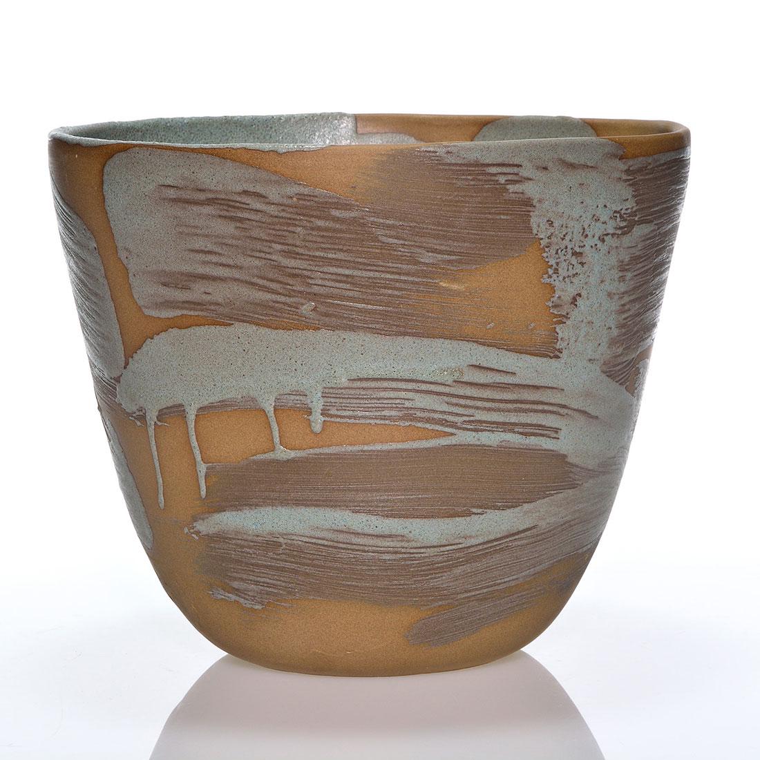 Studio vase by Edith Heath, 7 3/4 x 9 5/8": Studio stoneware vase done by Edith Heath, a graduate of the California School of Fine Arts in San Francisco. The interior is done in a volcanic style with the exterior showing large brushed swipes an