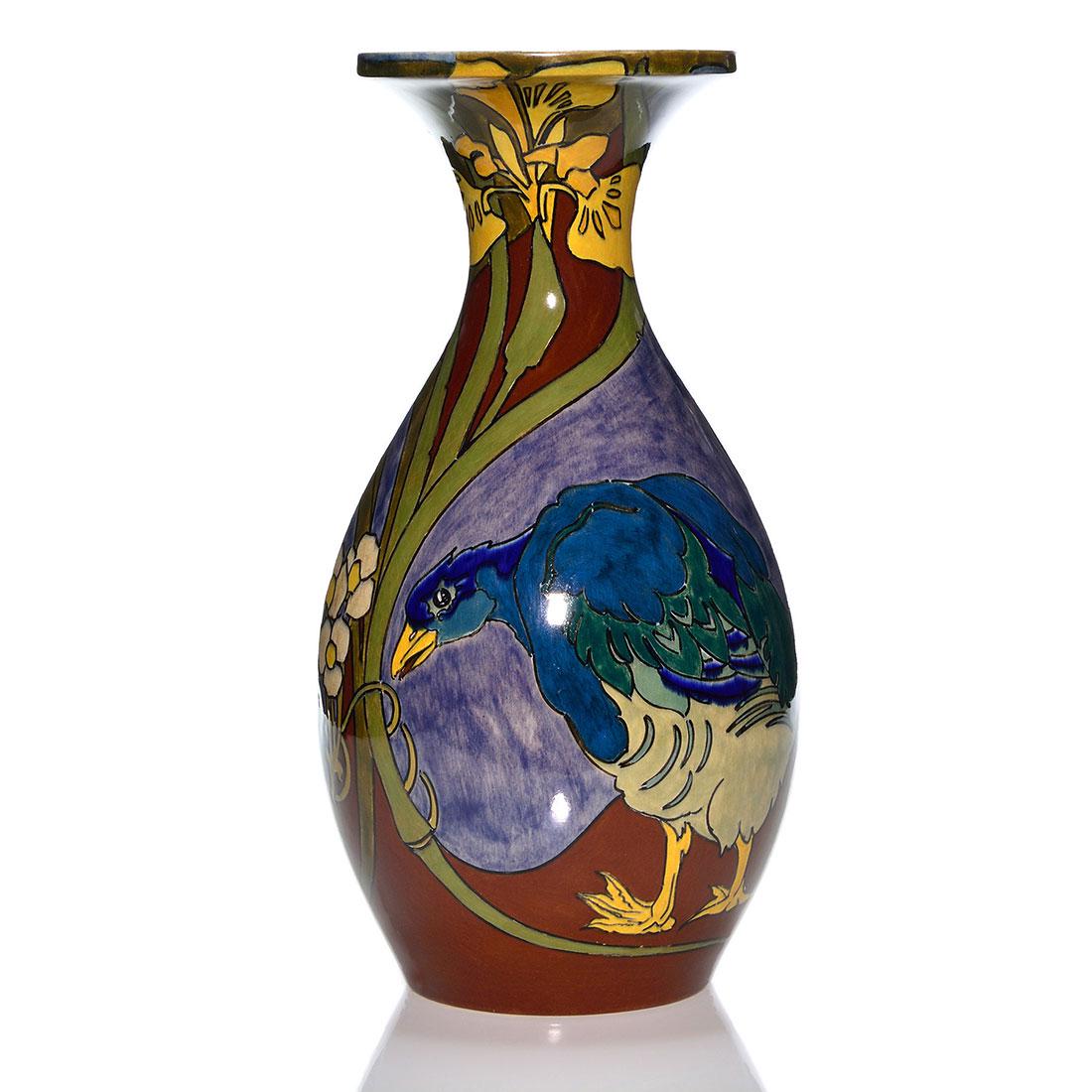 Tall Rozenburg pottery vase, blue ducks, 1900, 15 7/8": Tall Rozenburg pottery vase with exotic blue ducks and irises painted in 1900. Marks include the Rozenburg logo, the "Bee" date symbol for 1900, shape number W 462V and work order 57. Height 15 7/8 in