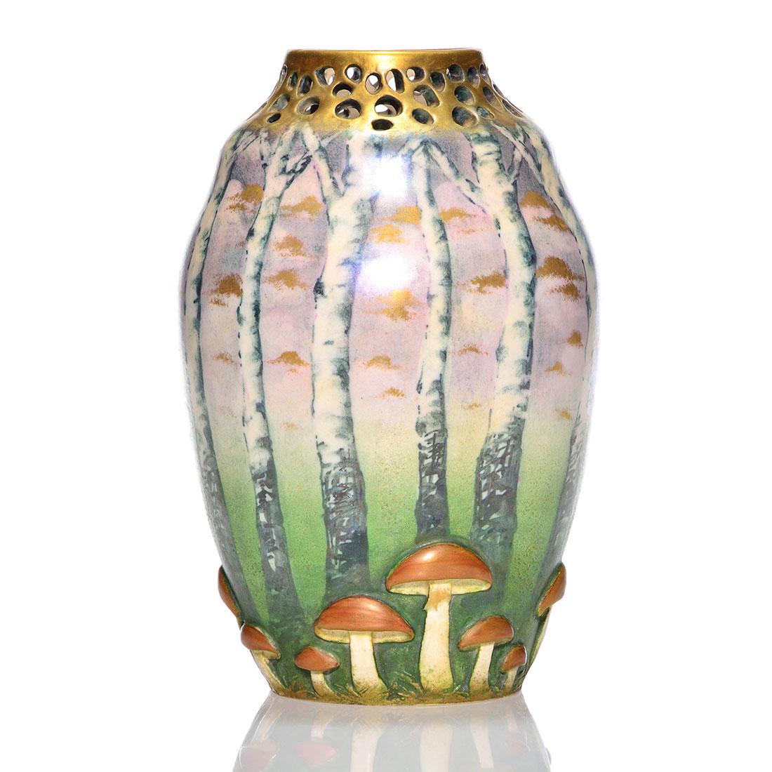 Paul Dachsel mushroom and birch tree scenic vase, 8 1/2: Good Paul Dachsel mushroom and birch tree vase with reticulated rim. Signed with partial Paul Dachsel purple logo on the bottom. Height 8 1/2 inches. Nice iridescence to the glaze. Neat drill hole in 
