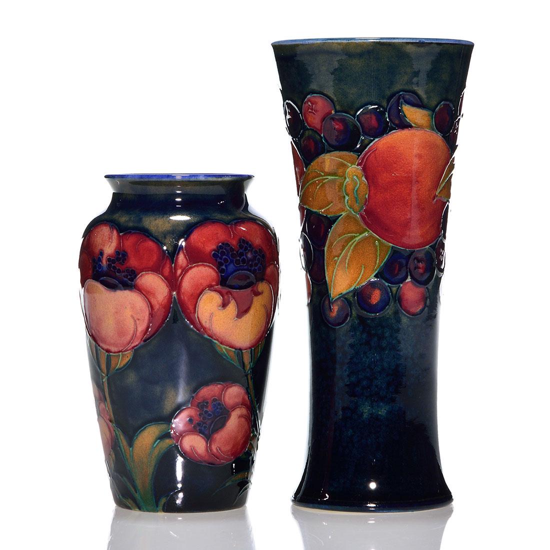 2 Moorcroft vases, 7" Pomegranite, 5" Big Poppy,: Two Moorcroft vases. 1) 7 inch Pomegranite, impressed Moorcroft, Made in England and William Moorcrofts painted signature. 2) 5 inch Big Poppies, impressed Moorcroft, Made in England and shape number 