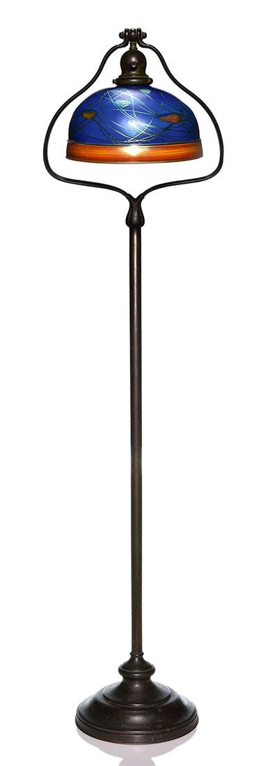 Steuben Blue Aurene shade & Handel floor lamp, 58": Regal Steuben and Handel floor lamp. The 10 inch Steuben Blue Aurene shade is embellished with Gold Leaf and Vine decoration and has an enlightening Calcite encasement with the enhancement of a wide G