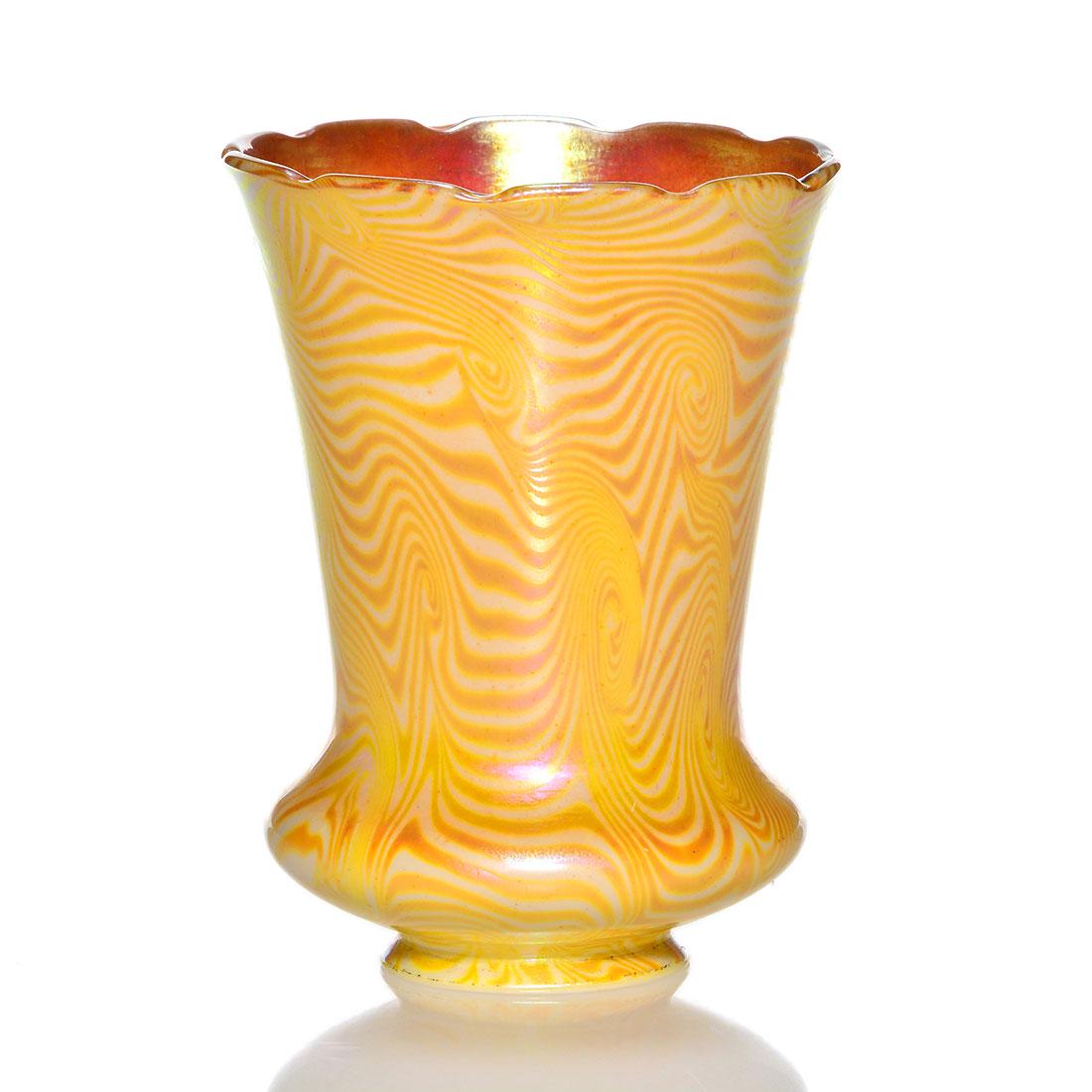 Steuben shade, King Tut, shape 2379, 5 3/4": Steuben shade having the golden King Tut design evenly arranged over Calcite and has a blended gold interior. Shape 2379. Partial silver mark. Small open bubble to interior. Height is 5 3/4 inches. Li