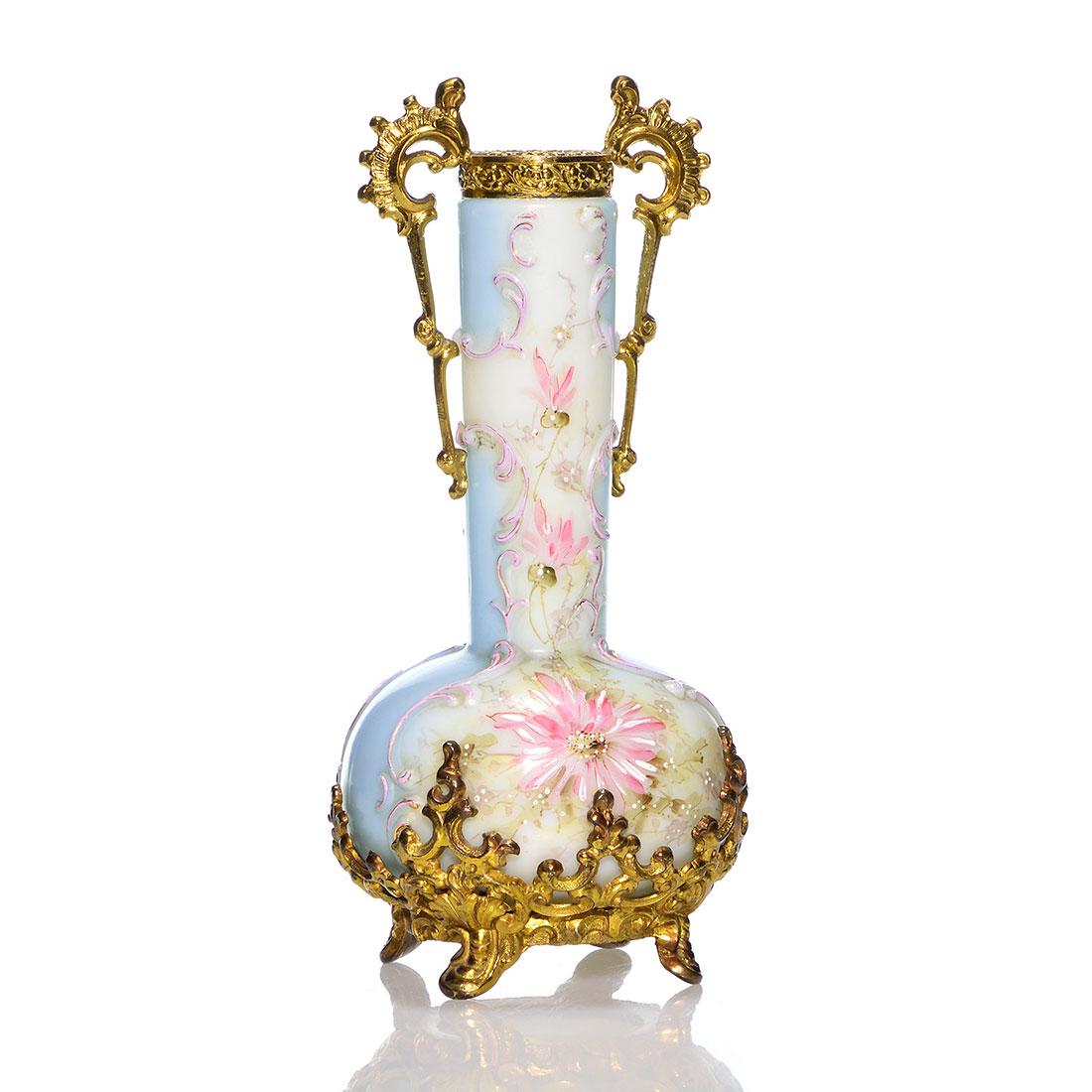 Wavecrest vase, ormolu base & handled rim, 8 1/4": Wavecrest vase boasting a fanciful pierced ormolu base and double scroll handles and beautifully decorated with pink mums bordered by raised scrolling. Height 8 1/4 inches. Seldom the ormolu is comple