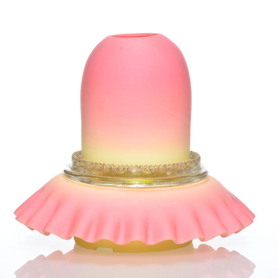 Thos Webb Burmese Pyramid fairy lamp, marked, 4 1/2": Thomas Webb & Sons Queens Burmese Pyramid fairy lamp. The crimped petticoat base has the logo of Thos Webb & Sons Queen Burmese plus the S. Clarke Fairy trademark. The 2 5/8 inch shade rests on a clea