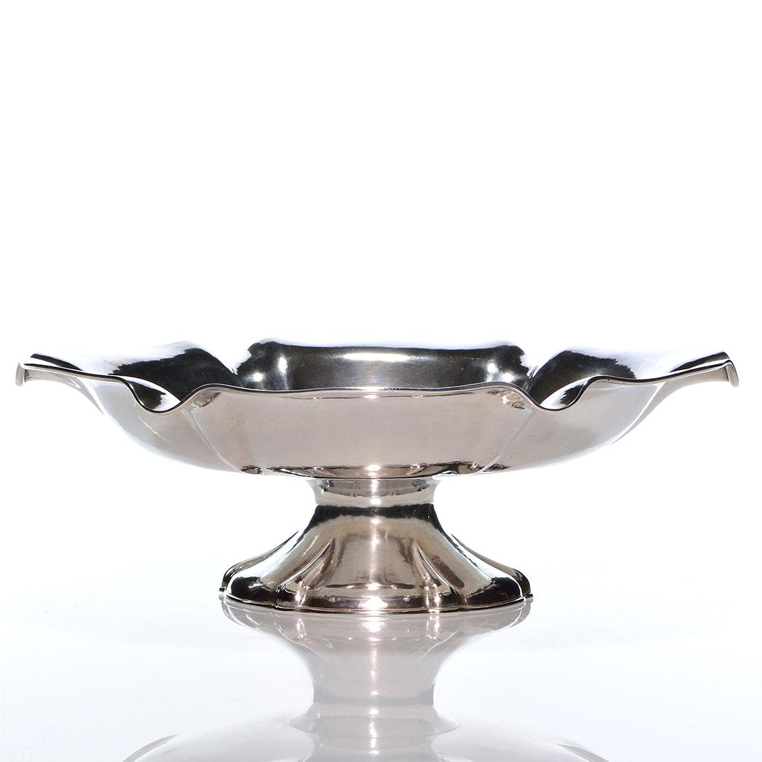 Arts & Crafts Kalo Shop sterling compote, 12 1/2"D: Sizable Kalo Shop Arts & Crafts sterling silver center compote. A lobed bowl on a flaring base each receiving supple surface hammering measuring 4 1/4 inches by 12 1/2 inches across. Impressed Sterlin