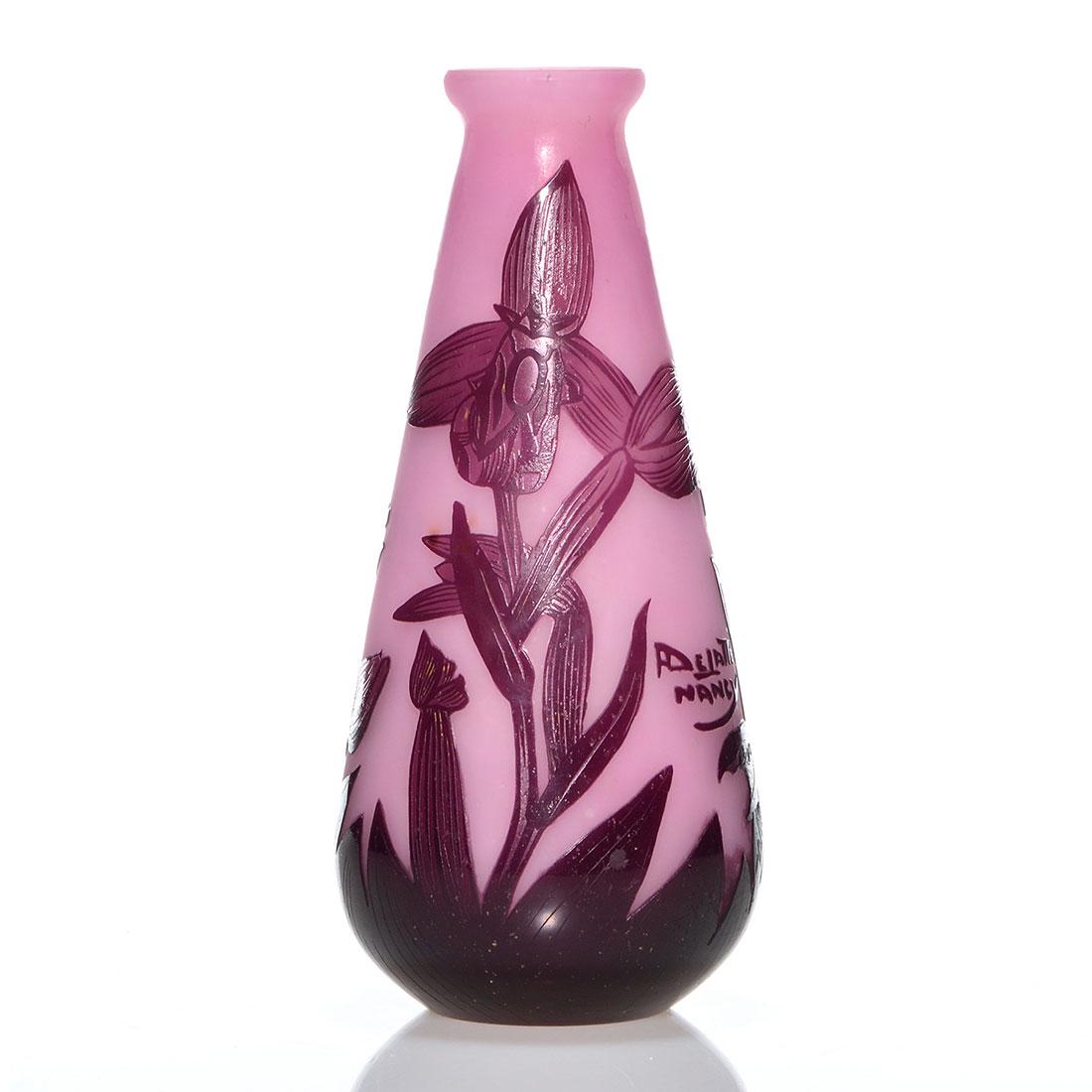 Delatte cameo vase, orchids,7 7/8", signed: Andre Delatte Nancy vase with orchids in various stages of growth done in purple over pastel pink. Height 7 7/8 inches. Cameo signature on the side. Crisp design.