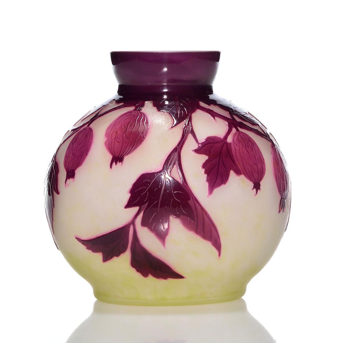 Delatte cameo vase, gooseberry branch, 4 1/4", signed: Andre Delatte Nancy cameo vase revealing purple gooseberries on a foliaged branch. The background is almond speckled with lime at the base. Measures 4 1/4 inches by 4 1/2 inches across. Cameo signatur