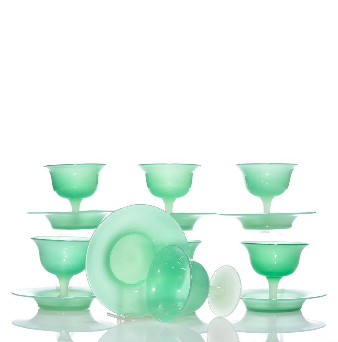 14 Steuben green Jade: 7 sherbets & 7 under plates: Seven Steuben sherbets in green Jade and Alabaster, 3 7/8 inches with their 6 inch green Jade under plates. Excellent handsome condition.