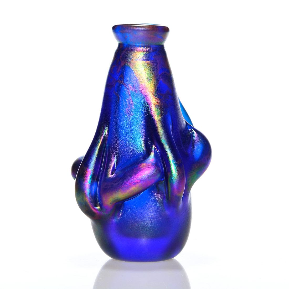 Labino Freeform vase, sapphire blue, decorated, 7 1/4": Early Dominick Labino Freeform vase upon which Mr. Labino purposely expanded the surface vertically and horizontally then adding bright splashes of iridescent gold and magenta patterns to the neck and