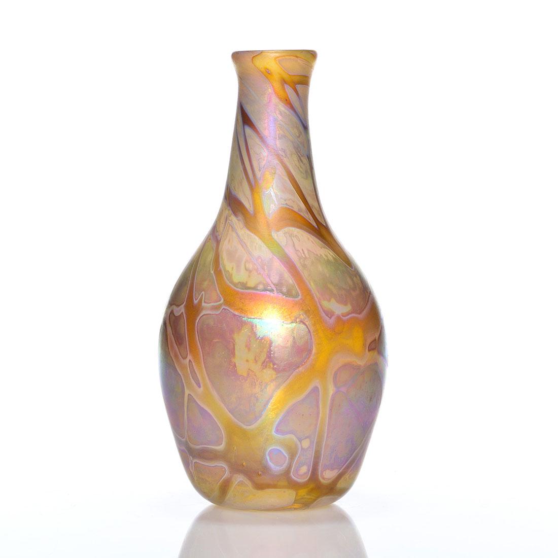 Christopher Ries Tiffany-style vase, 9 3/8", signed,: Early Christopher Ries bottle vase in the style of Tiffany, a creamy honey amber fused with a tangle of vines. Height 9 3/8 inches. Engraved Christopher Ries, 1975. Pleasing matte surface and bright r