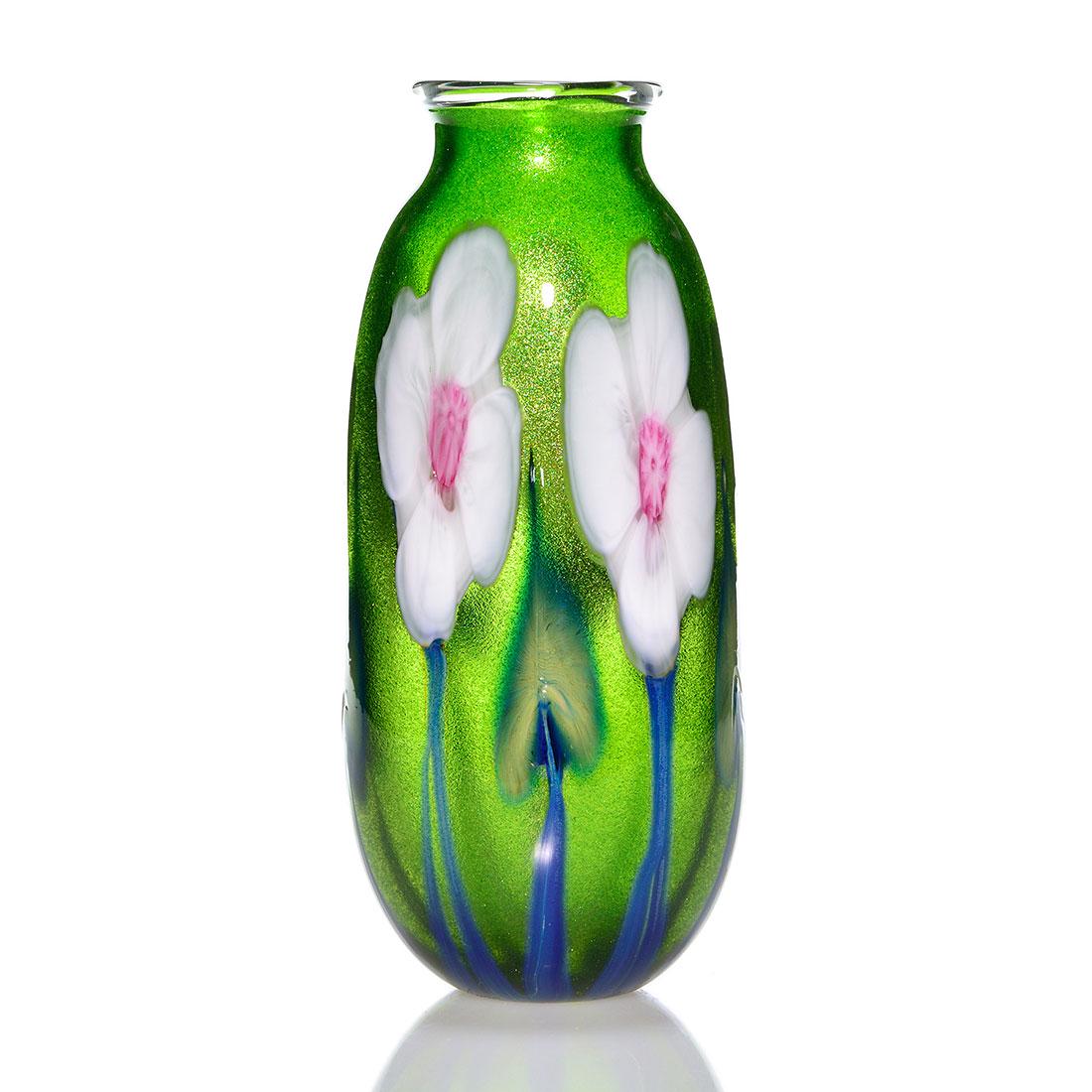 Early Charles Lotton Aventurine Flora vase, 9 3/4": Early Charles Lotton emerald green Aventurine vase surrounded by large bridal white blossoms separated by custard blue leaves, all growing from cobalt blue stems. Crystal lip wrap. Height 9 3/4 inches
