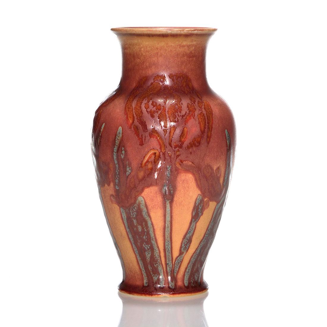 Rookwood Wax Mat vase, floral, Jensen, 1943, S, 7 1/8": Wax Mat vase decorated with red irises, the work of Jens Jensen in 1943. Marks include the Rookwood logo, date, S for Special shape, Jensen’s incised monogram and a wheel ground X due to the vas