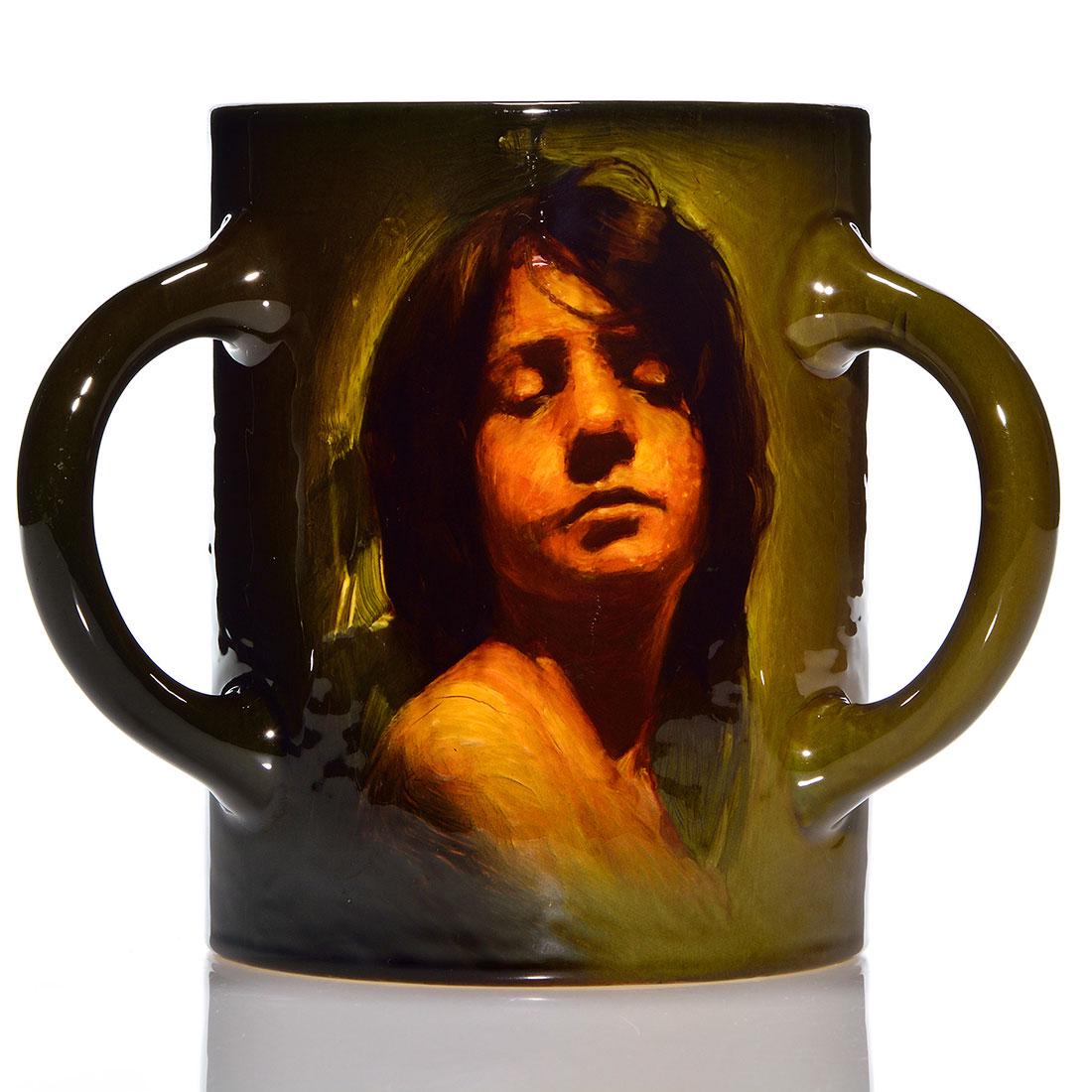 Rookwood Standard tyg, female, Young, 1898,830D, 6 1/4: Standard glaze tyg decorated with the portrait of a young girl, the work of Grace Young in 1898. Previously, this piece was sold as being the portrait of a young Native American Brave but we feel the 