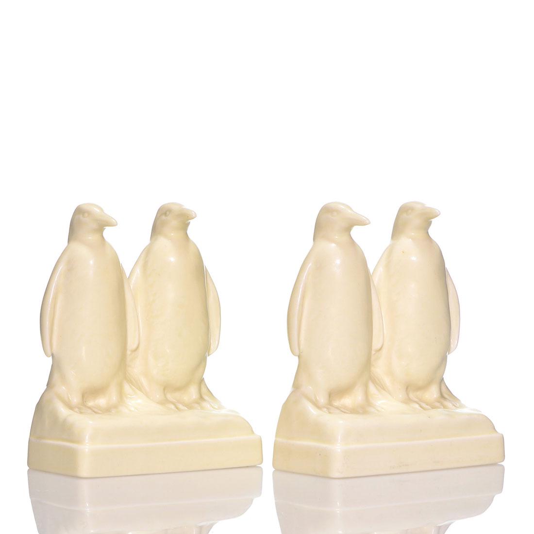Rookwood mat Penguin bookends, 1931, 2659, 5 3/4": Rookwood Penguin bookends in ivory mat glaze cast in 1931. Height 5 3/4 inches. Marks include the factory logo, date and 2659 shape. In excellent original condition.