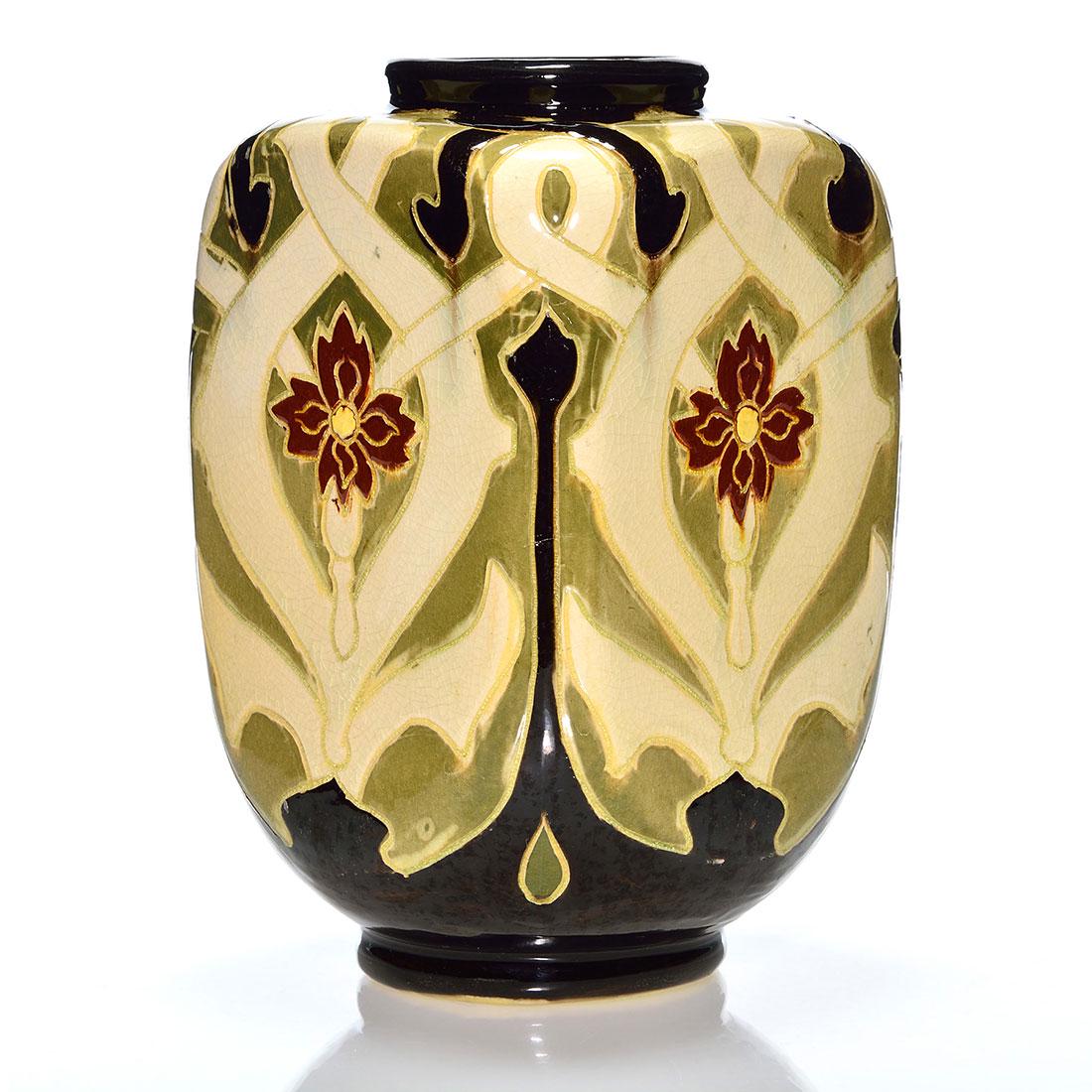 Weller Dickens Ware vase, carnations, 8 7/8”: Weller Dickens Ware First Line four sided vase with carnations decoration. Impressed Dickens Ware Weller, 572 and 5. There is fine overall crazing, dry crazing and some glaze flaking at the rim. Heigh