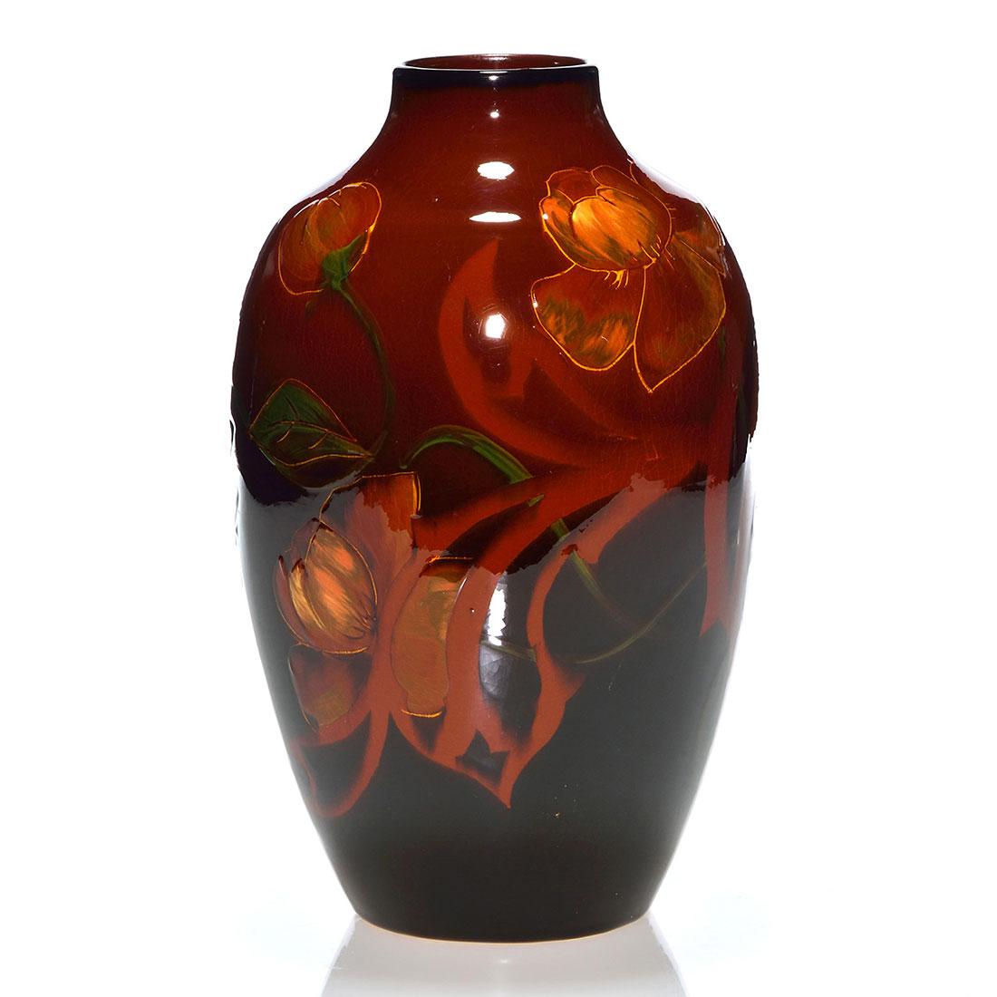 Weller Dickens Ware vase, poppies, 10 1/4”: Weller Dickens Ware First Line vase with poppy decoration. Impressed 664 and 1. There is fine overall crazing and light glaze scratches. Height is 10 1/4 inches. There is an exhibition sticker from &#