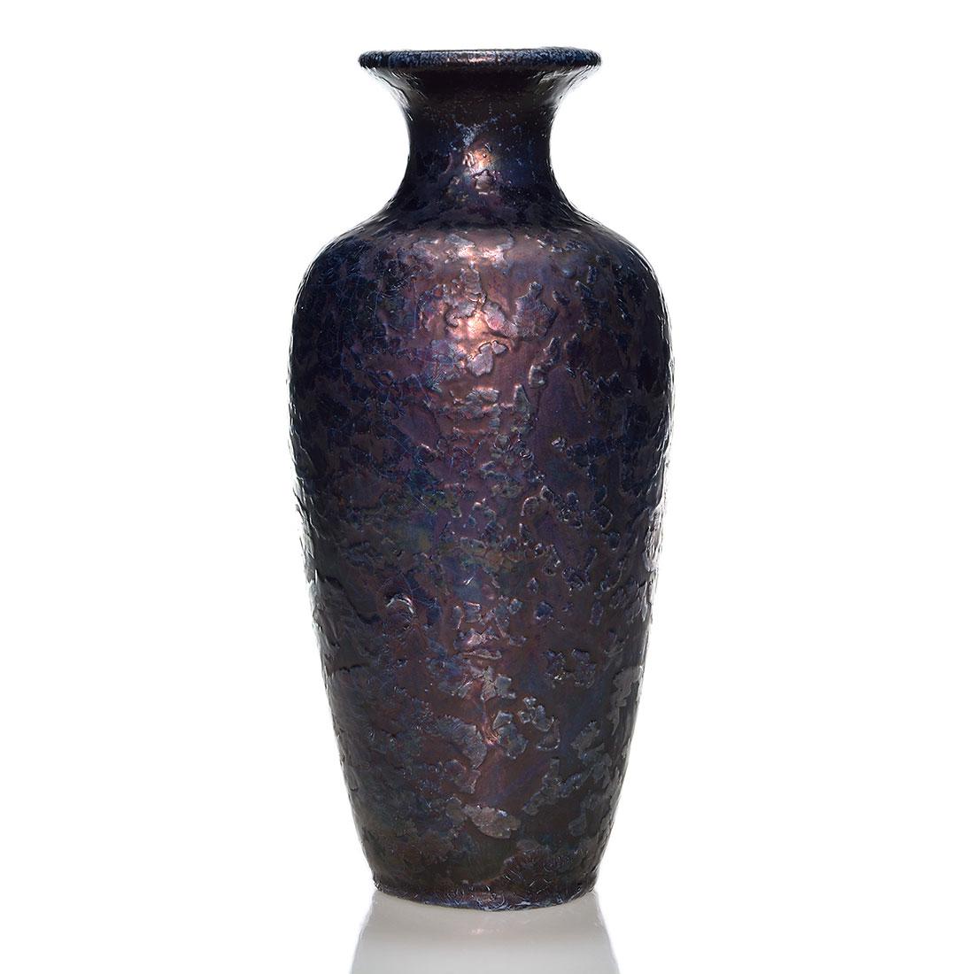Large Weller Bronze Ware vase, 14 3/4”: Large Weller Bronze Ware vase with an irregular raised surface covered by a rich amethyst purple and blue black luster glazes and a coppery color to one side. Height 14 3/4 inches. Unmarked. All over 