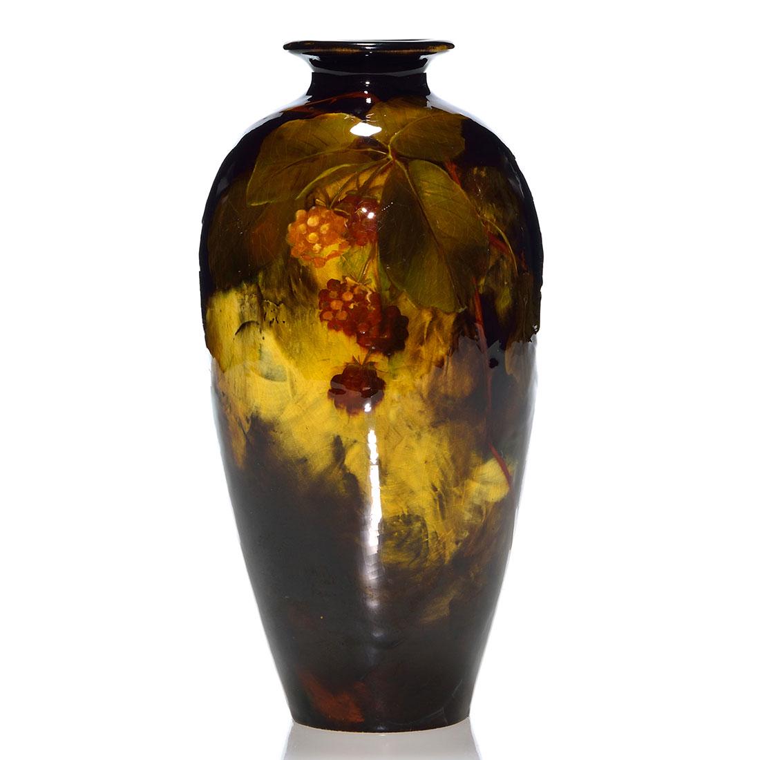 Weller Aurelian vase, blackberries, Timberlake, 9": Weller Aurelian vase with blackberry decoration done by Mae Timberlake. Marks include incised Aurelian W and impressed Weller 487 O on the bottom. Timberlake's conjoined monogram appears on the front 