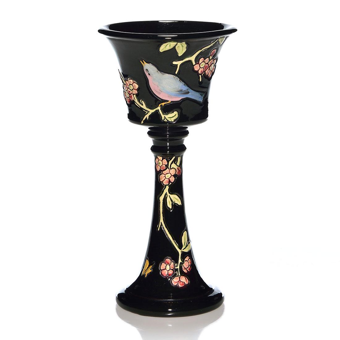 Weller Rosemont chalice with birds, 9 7/8”: Weller Rosemont chalice with flowers and birds against a glossy black ground. Impressed WELLER on the base. There is faint overall crazing. Height is 9 7/8 inches.