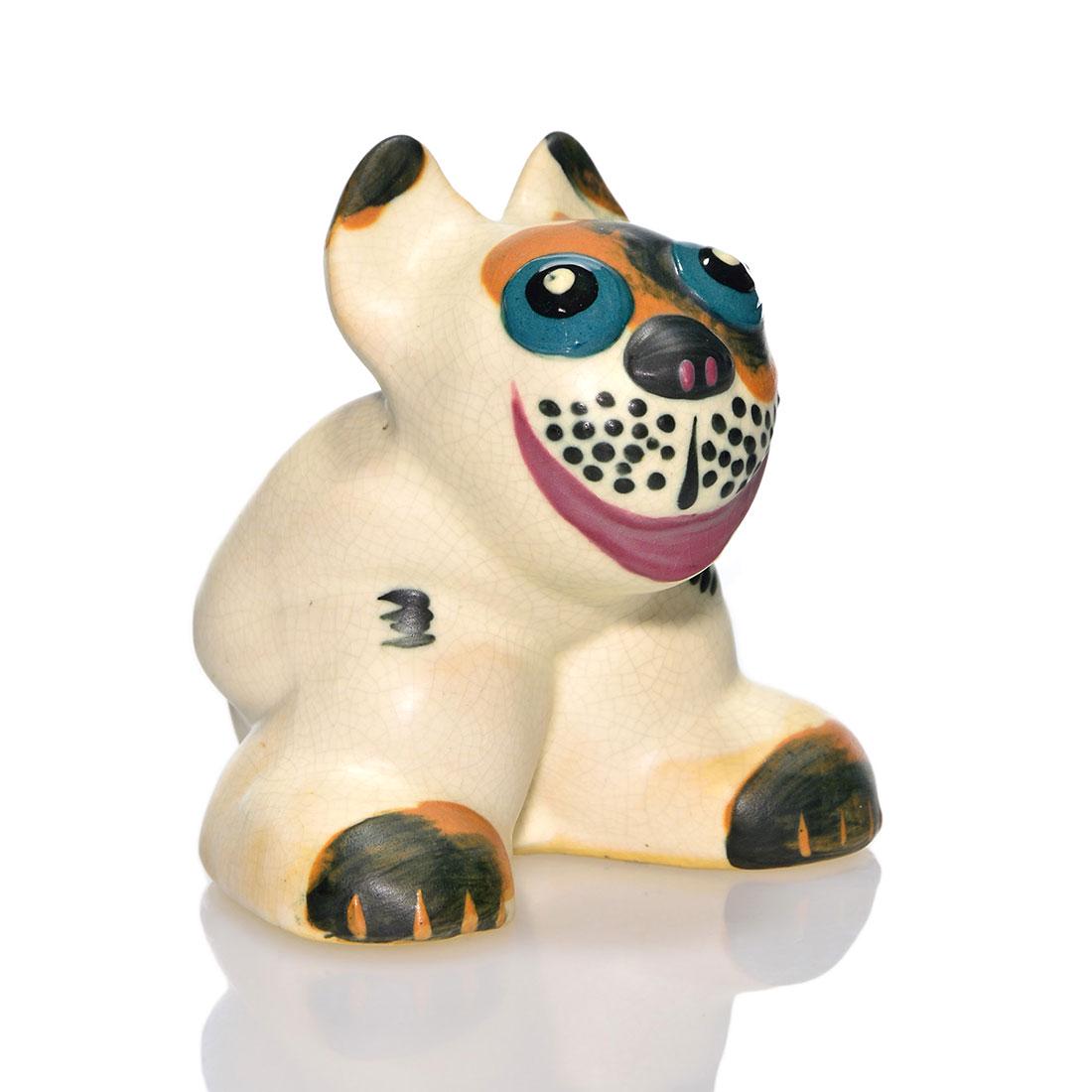 Weller Popeye dog, 4”: Weller Popeye dog. Incised Weller Pottery in script on the bottom. There is fine overall crazing. Height is 4 inches.