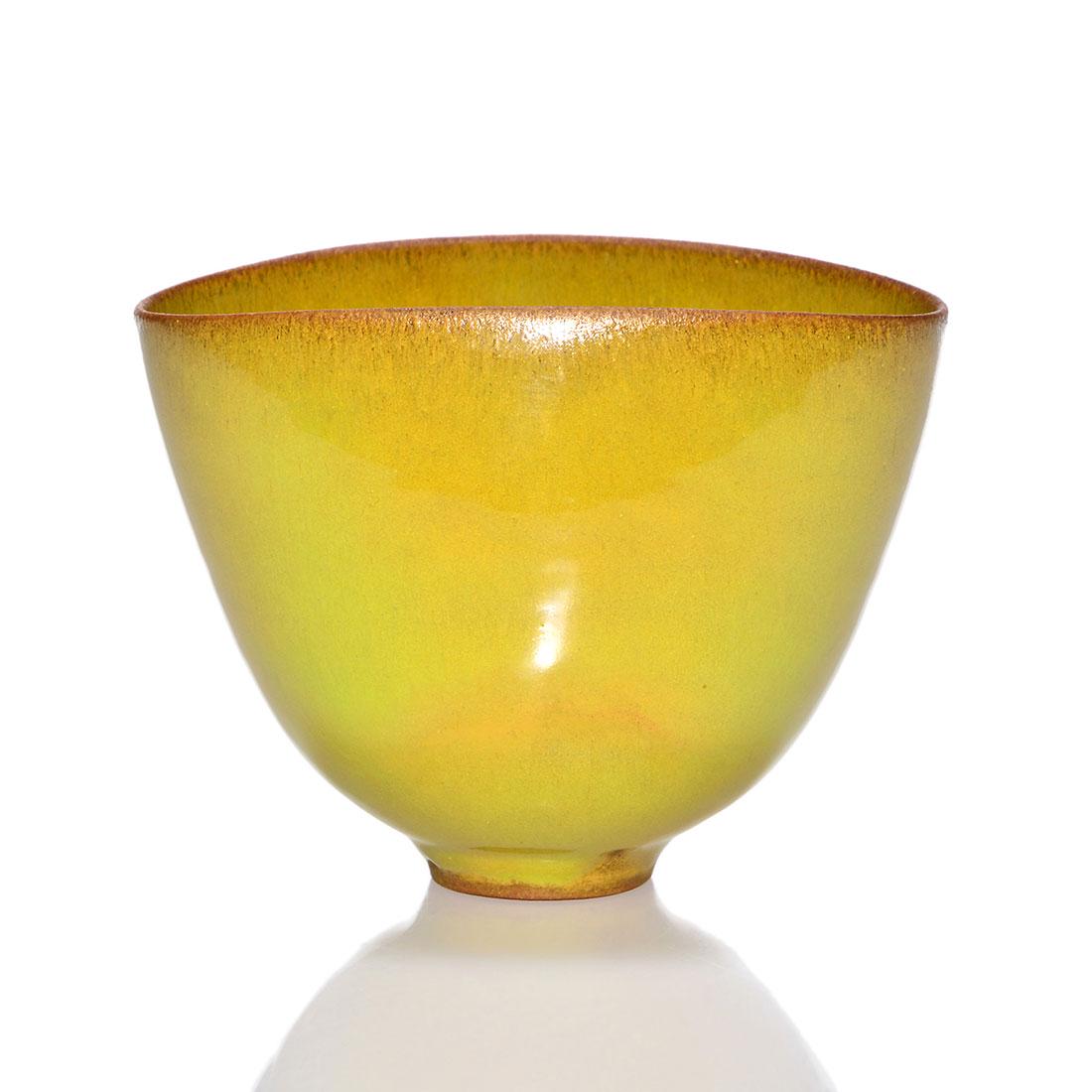 Gertrude & Otto Natzler pinched bowl, high glaze,3 1/2": Gertrude and Otto Natzler pinched bowl with a yellow high glaze over an earthenware body. Marked Natzler on the bottom in slip. Excellent original condition. Height is 3 1/2 inches.
