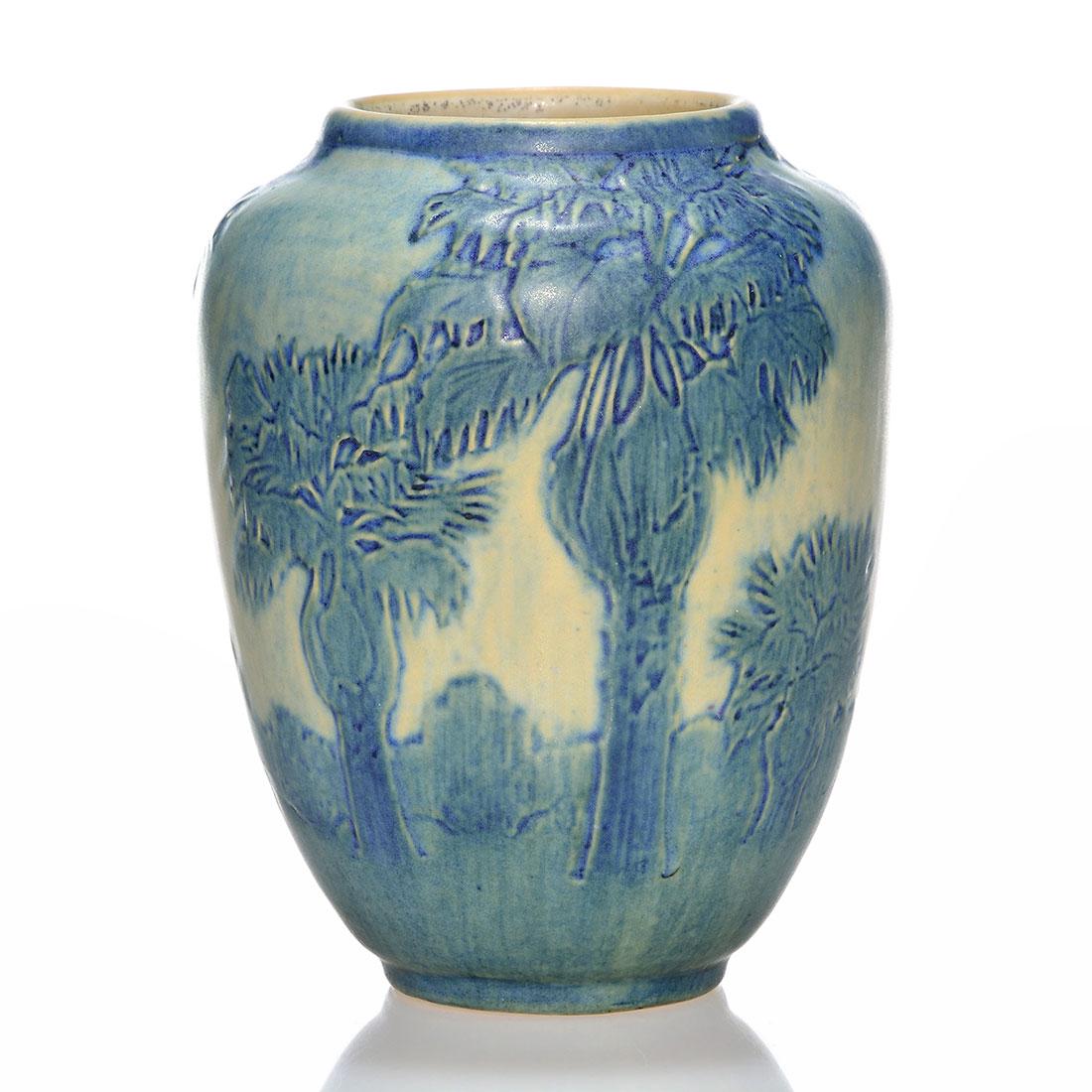 Newcomb vase, 6 1/8”, Palm trees, Simpson, 1917: Newcomb College scenic vase viewing a grove of Palm trees carved and painted by Anna Francis Simpson in 1917. Height 6 1/8 inches. Impressed with the factory logo, date code IN24, shape 181, the mark