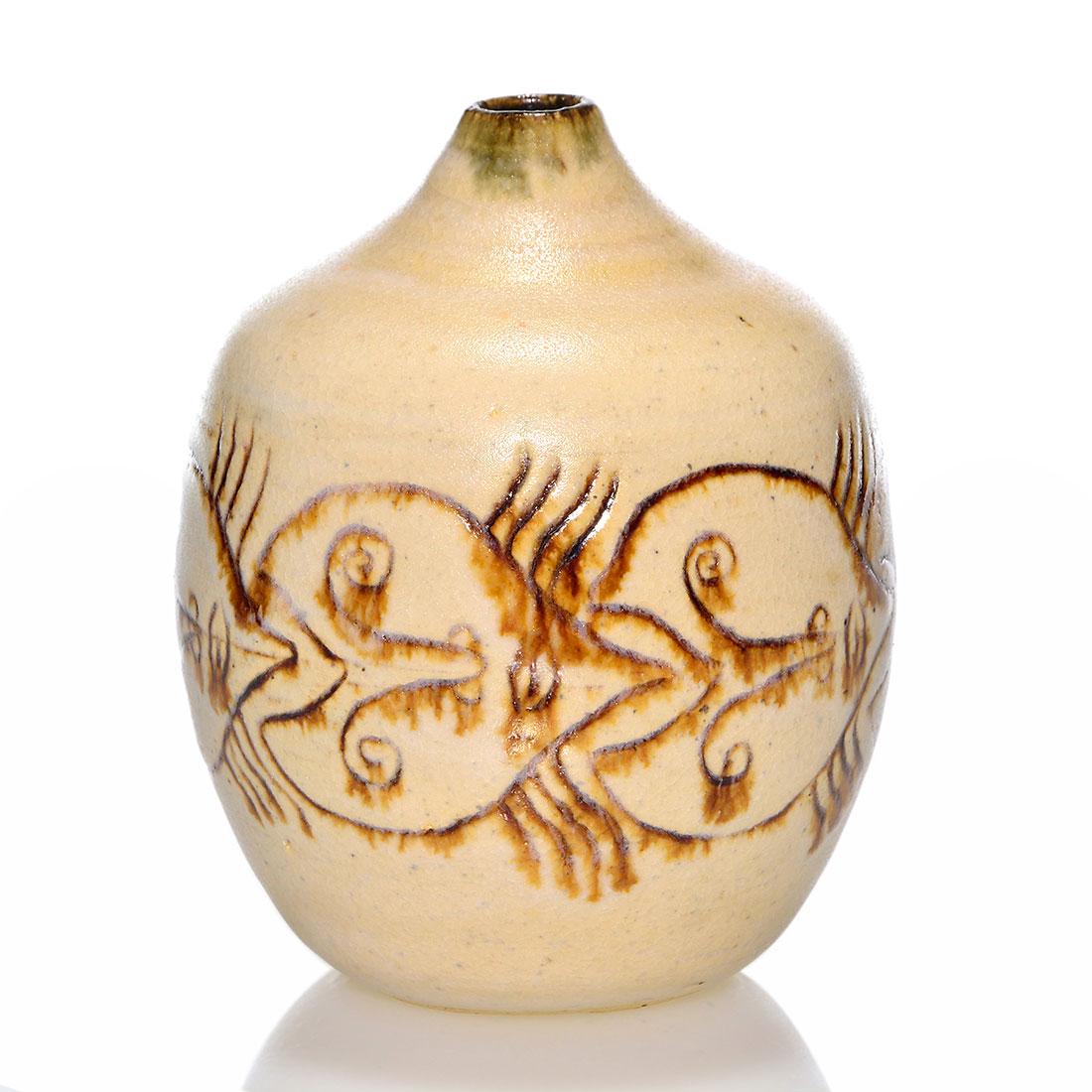 Scheier vase with faces encircling the body, 5 1/8": Edwin and Mary Scheier vase with a band of interlocking faces encircling the body. Incised Scheier 7B on the bottom. Height 5 1/8 inches. Excellent condition.