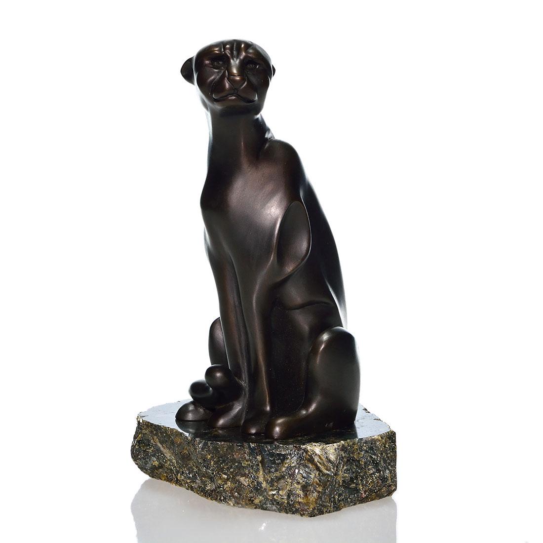 Limited Edition John Jagger bronze Panther, 8 3/4": Limited Edition bronze by internationally known sculptor, John Jagger of a panther at rest, her intaglio eyes focused towards the viewer. Engraved Jagger, '99, 24/1000. A black marble base accompanies