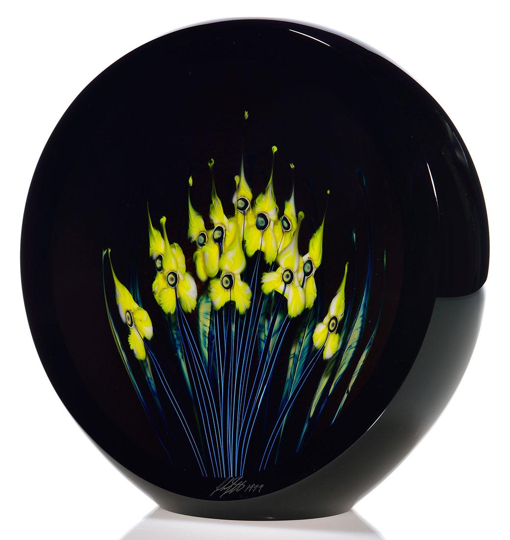John Lotton Black Magnum sculpture,yellow,10 1/4”: John Lotton Ebony Black Magnum sculpture, the front polished flat allowing the view of bright yellow trilliums rising above black stems bordered in silvery blue. The flowers are applied in three layer